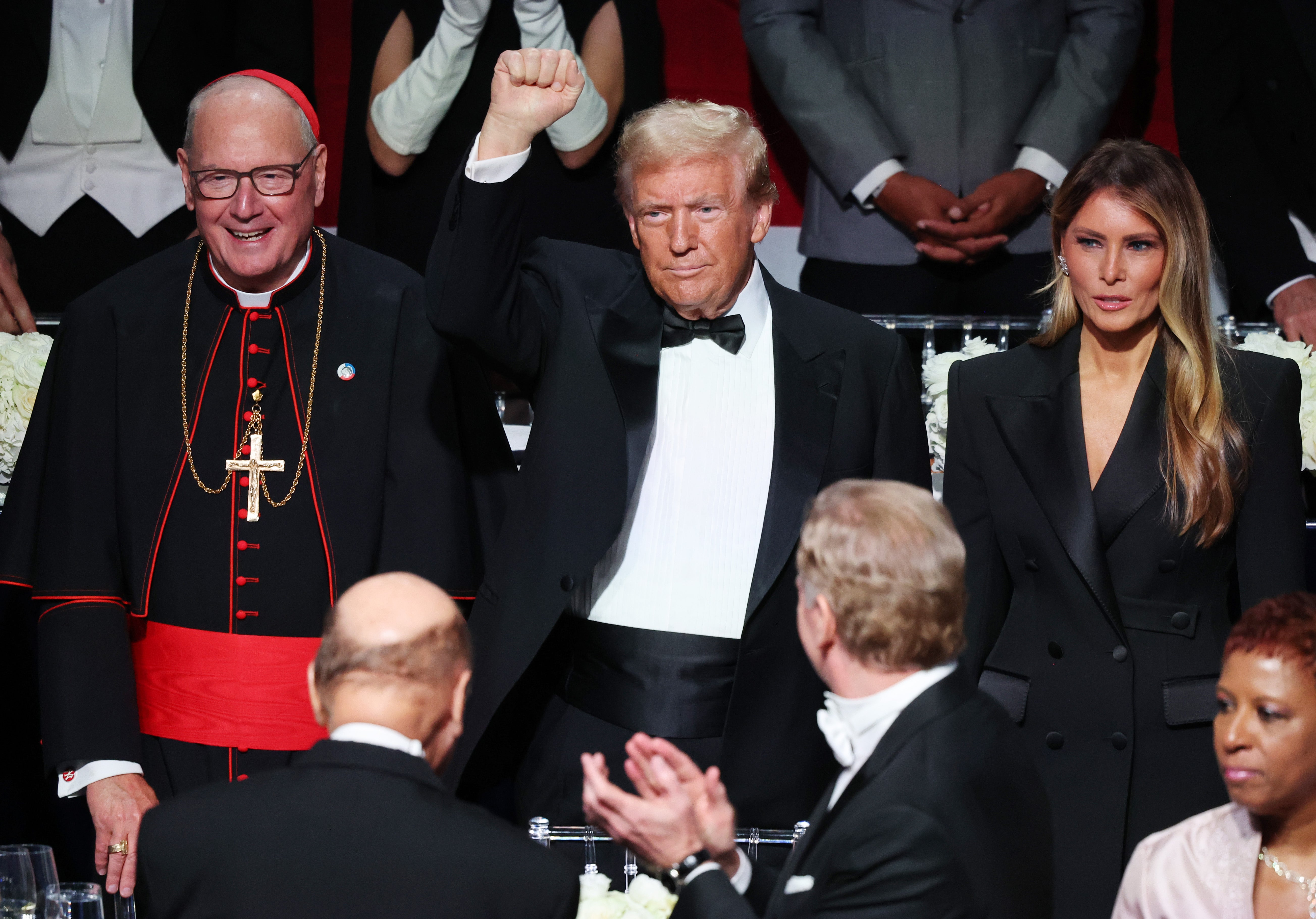 Cardinal Timothy Dolan with the Trump at the 2024 Al Smith dinner. Trump’s political rival Kamala Harris skipped the event so she could campaign in Wisconsin instead