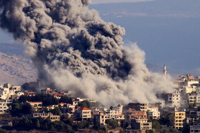 <p>Smoke billows from the site of an Israeli airstrike that targeted the southern Lebanese village of Khiam</p>