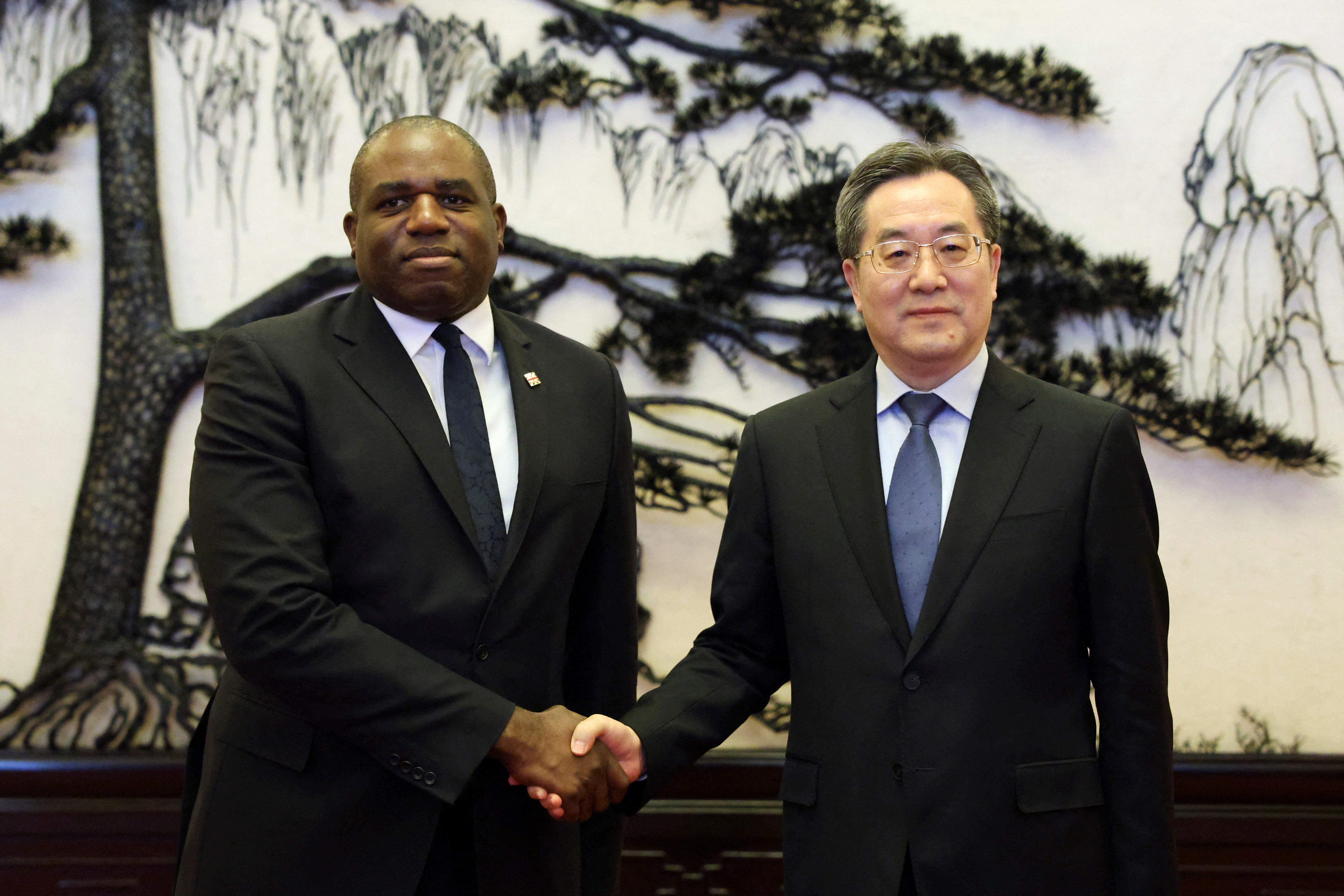 David Lammy meets Chinese vice premier Ding Xuexiang upon arrival in Beijing