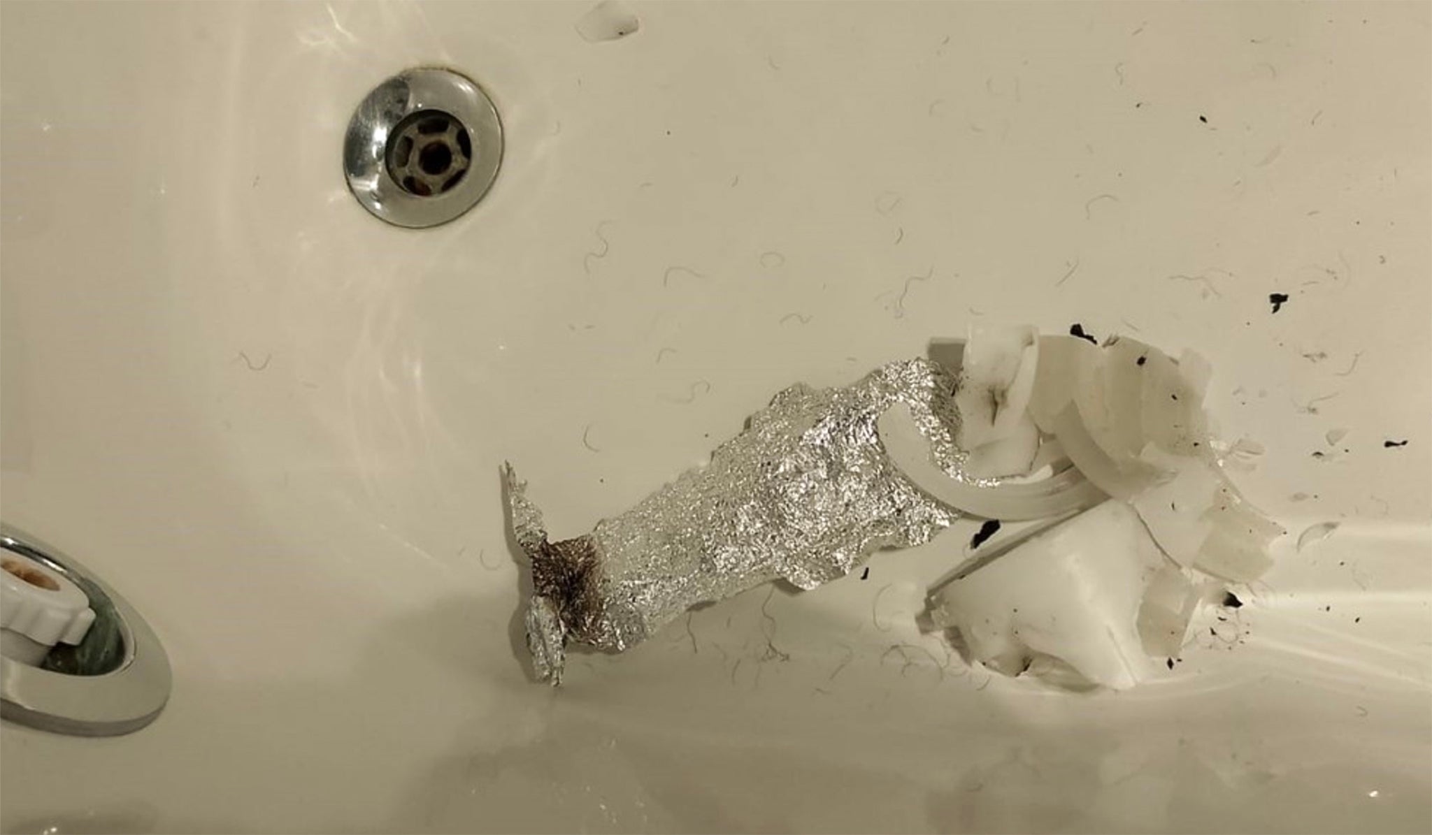 Pictures supplied by an “official source” also showed burned foil in the sink