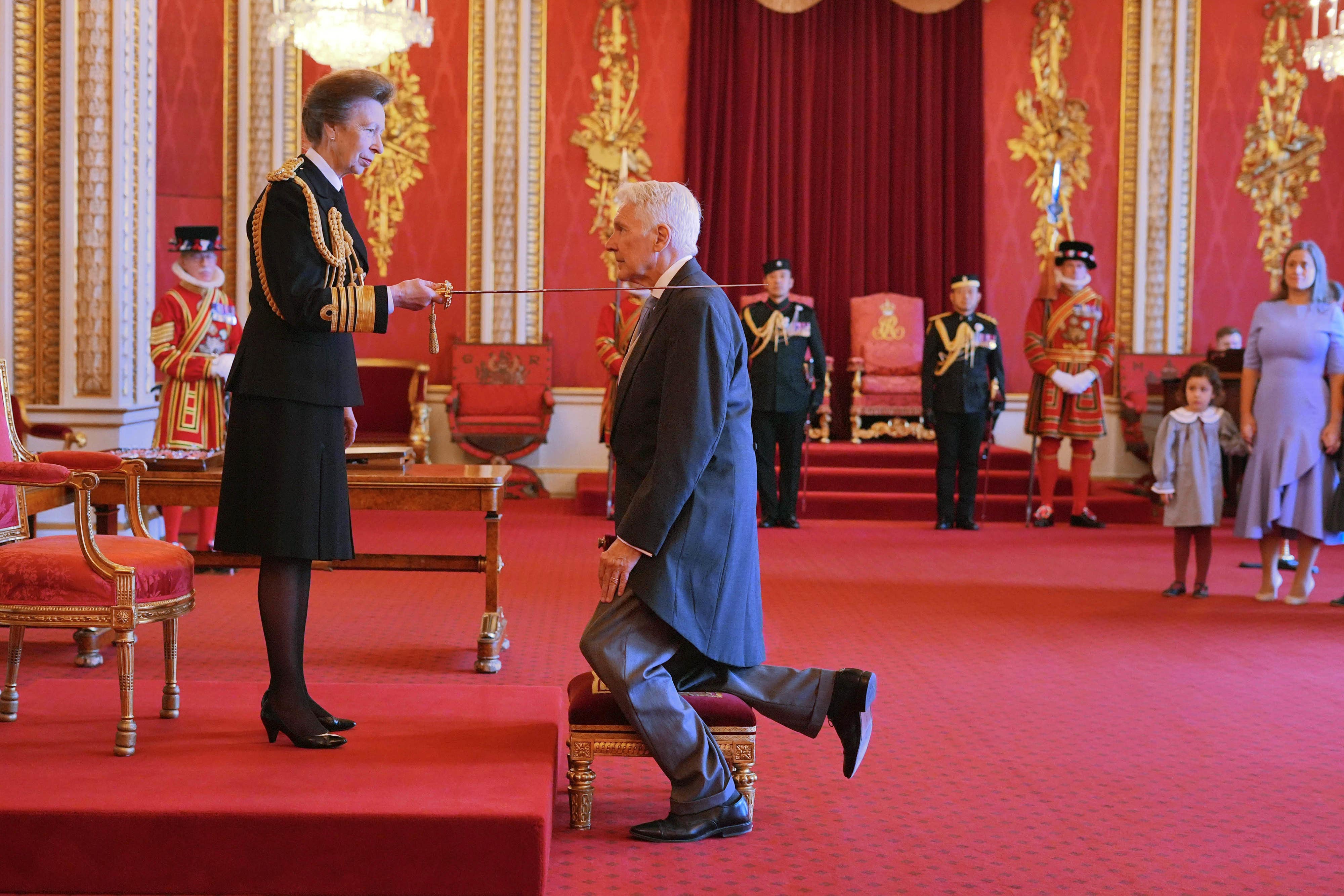 Professor Sir Philip Bobbitt is made a Knight Commander of the British Empire by the Princess Royal (Jordan Pettitt/PA)