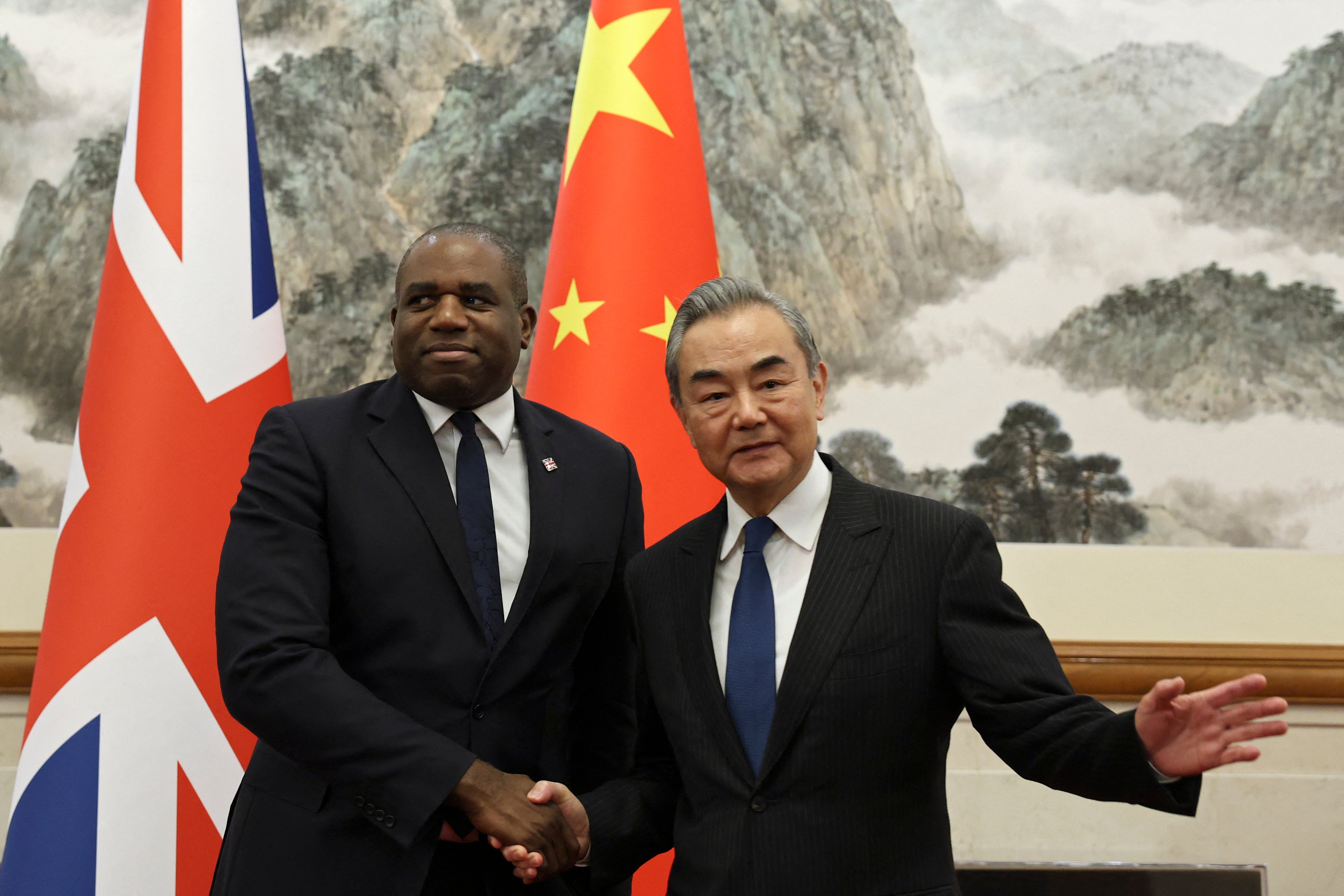 Britain's foreign secretary David Lammy (left) and Chinese foreign minister Wang Yi before their meeting at the Diaoyutai State Guesthouse in Beijing on 18 October, 2024.