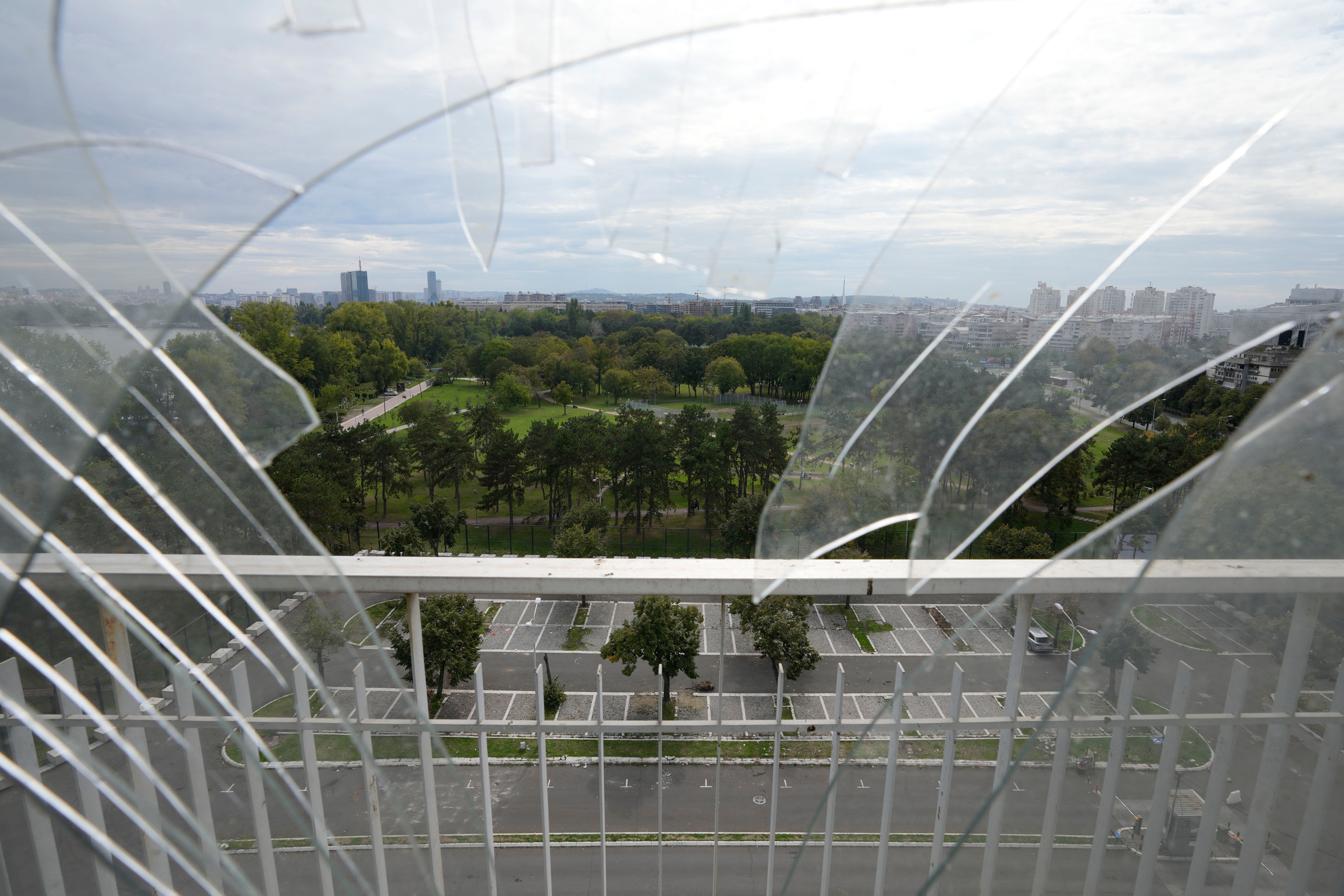 A general view of Belgrade is partially seen through the broken window from Hotel Yugoslavia