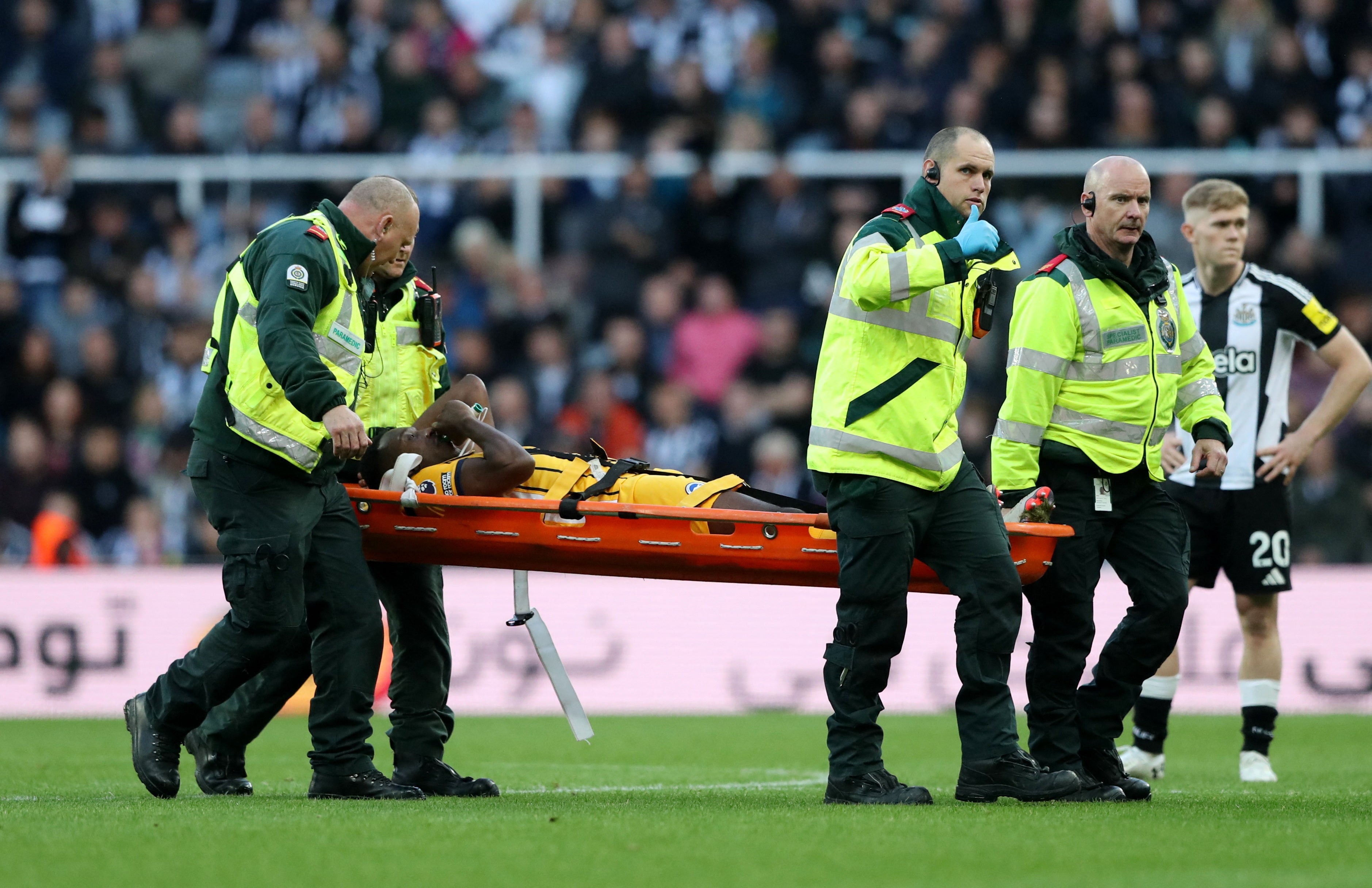 After his goal Danny Welbeck left the field on a stretcher with a suspected back injury.