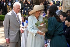 King Charles and Queen Camilla greeted by children outside Sydney church