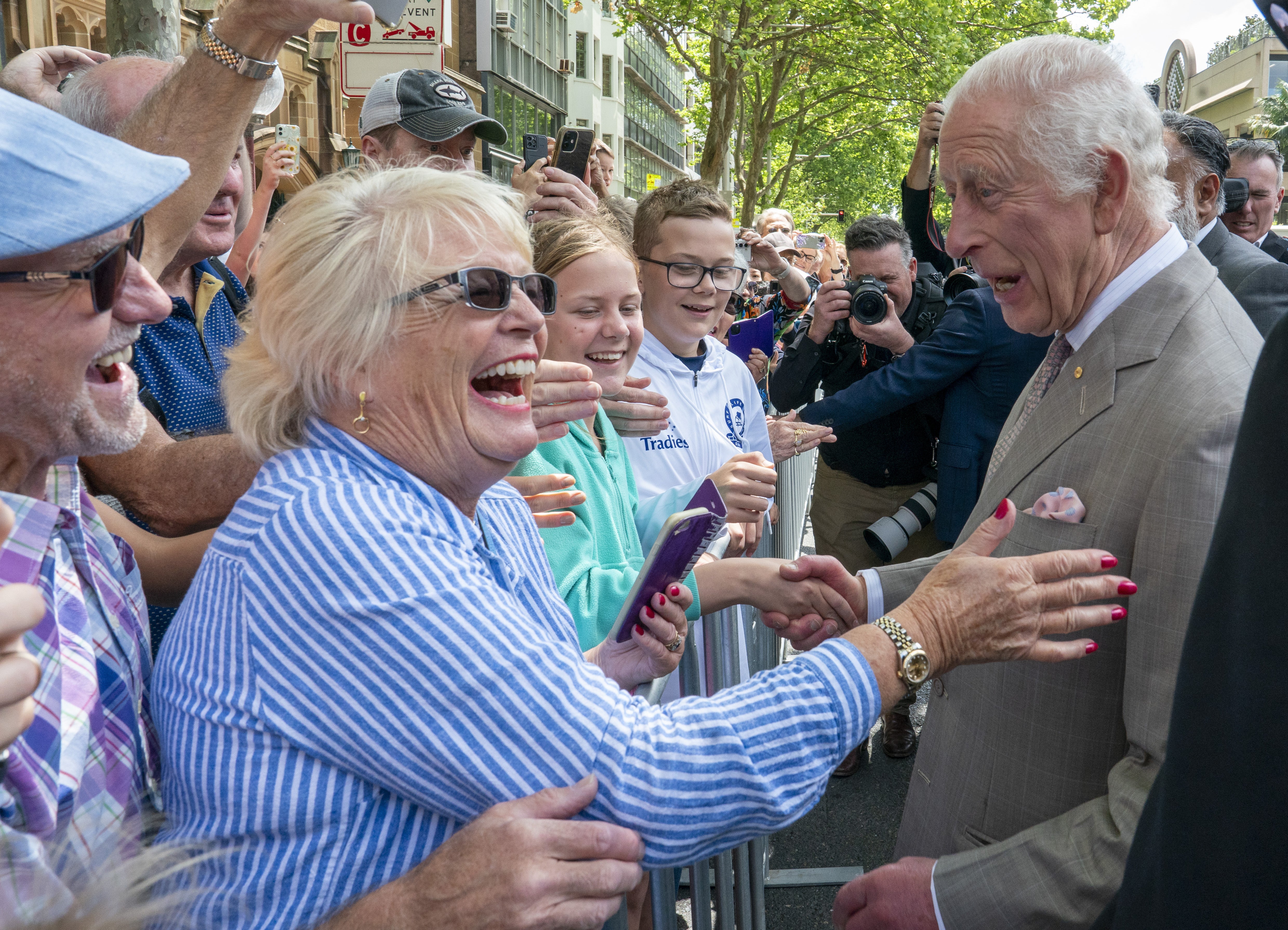 Joyous members of the Australian public meet the King