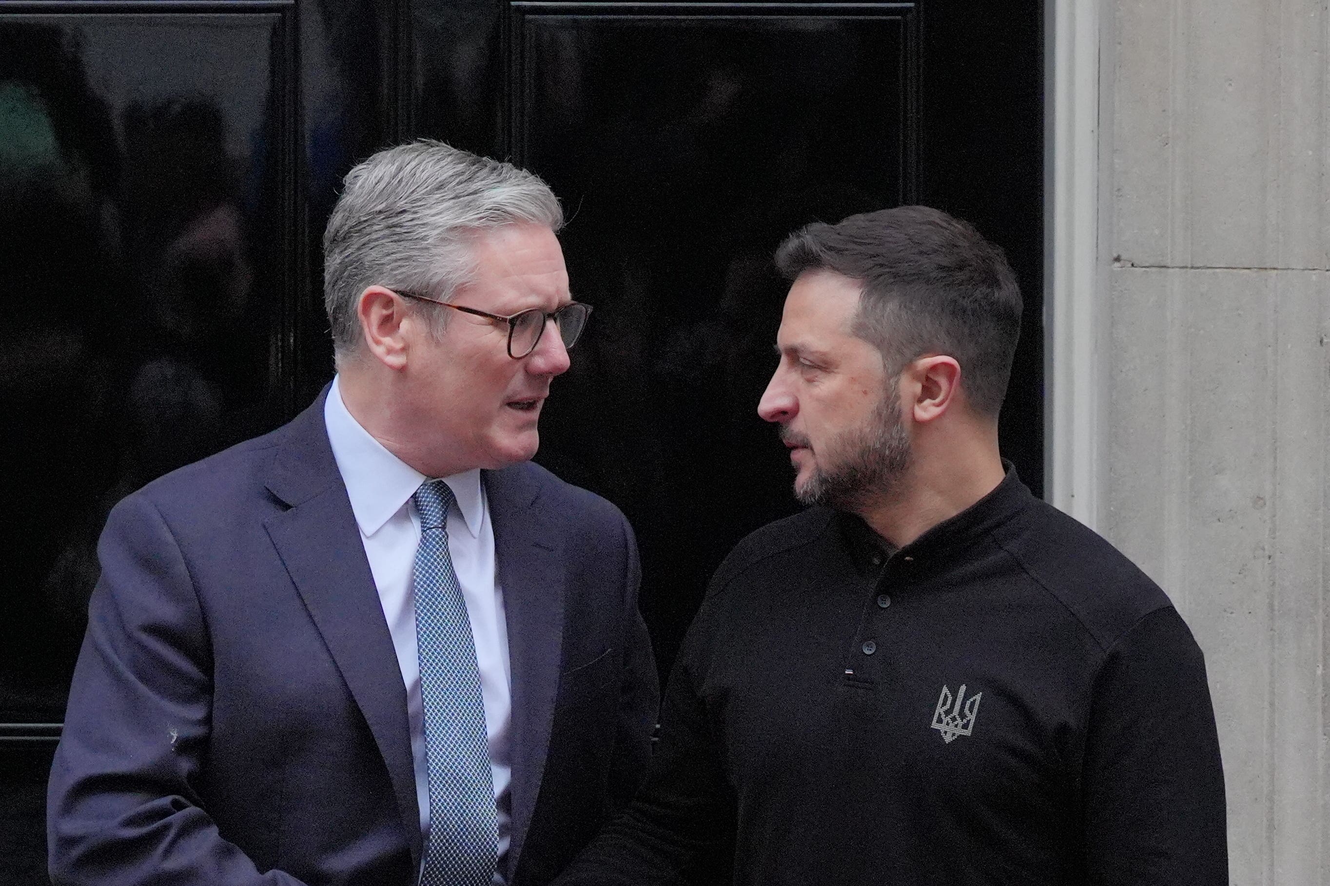 Ukrainian President Volodymyr Zelensky is greeted by Prime Minister Sir Keir Starmer (PA)