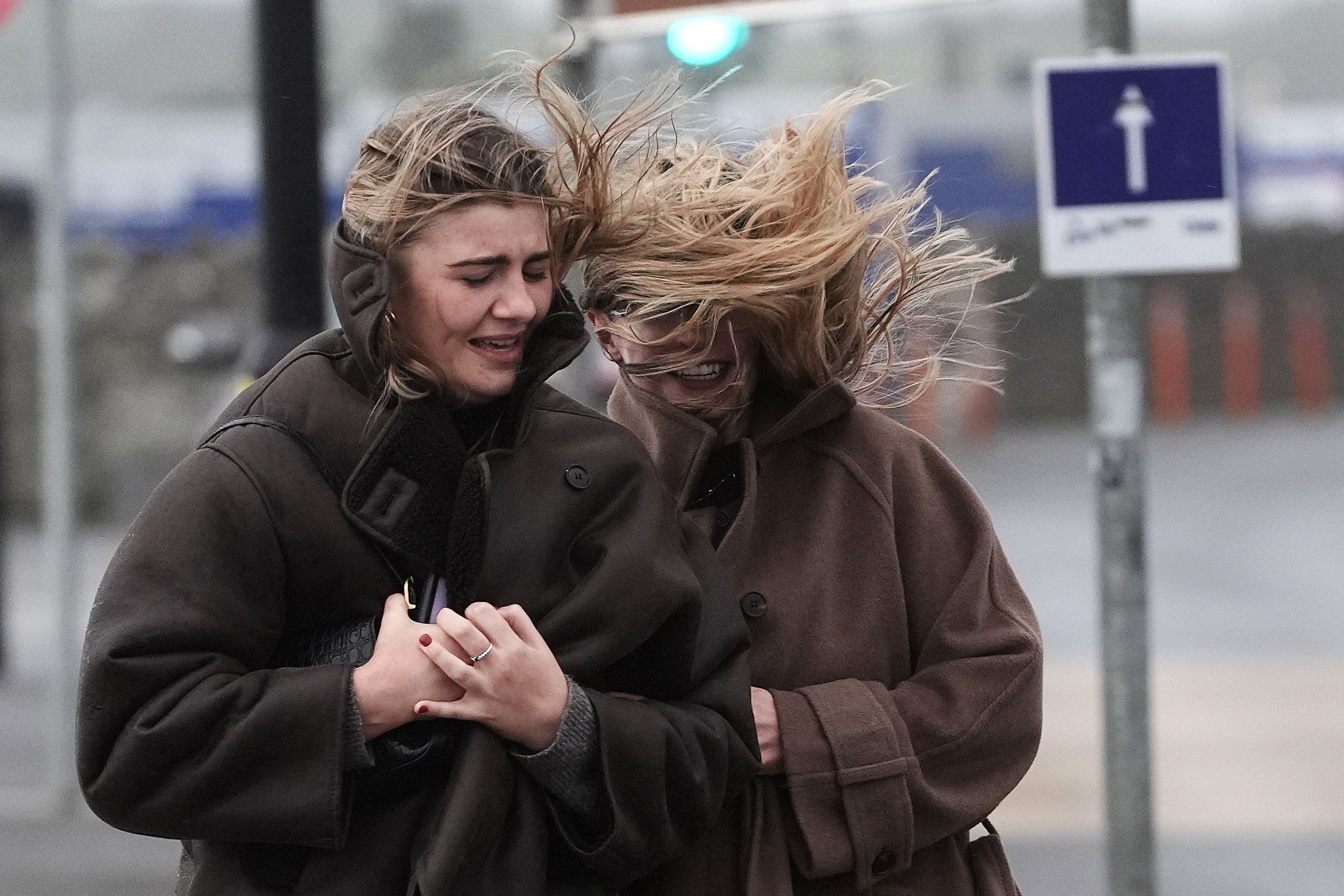 People struggle to walk in the wind on the promenade in Salthill, Galway, as a Met Eireann orange alert for Kerry, Leitrim, Sligo, Clare, Donegal, Mayo and Galway came into effect at 10am on Sunday and will be in place to 8pm as Storm Ashley sweeps across the island of Ireland. The forecaster said the first named storm of the season is to bring very strong and gusty south to south-west winds, coupled with high spring tides. The counties covered could see gusts of up to 130kph. Picture date: Sunday October 20, 2024.