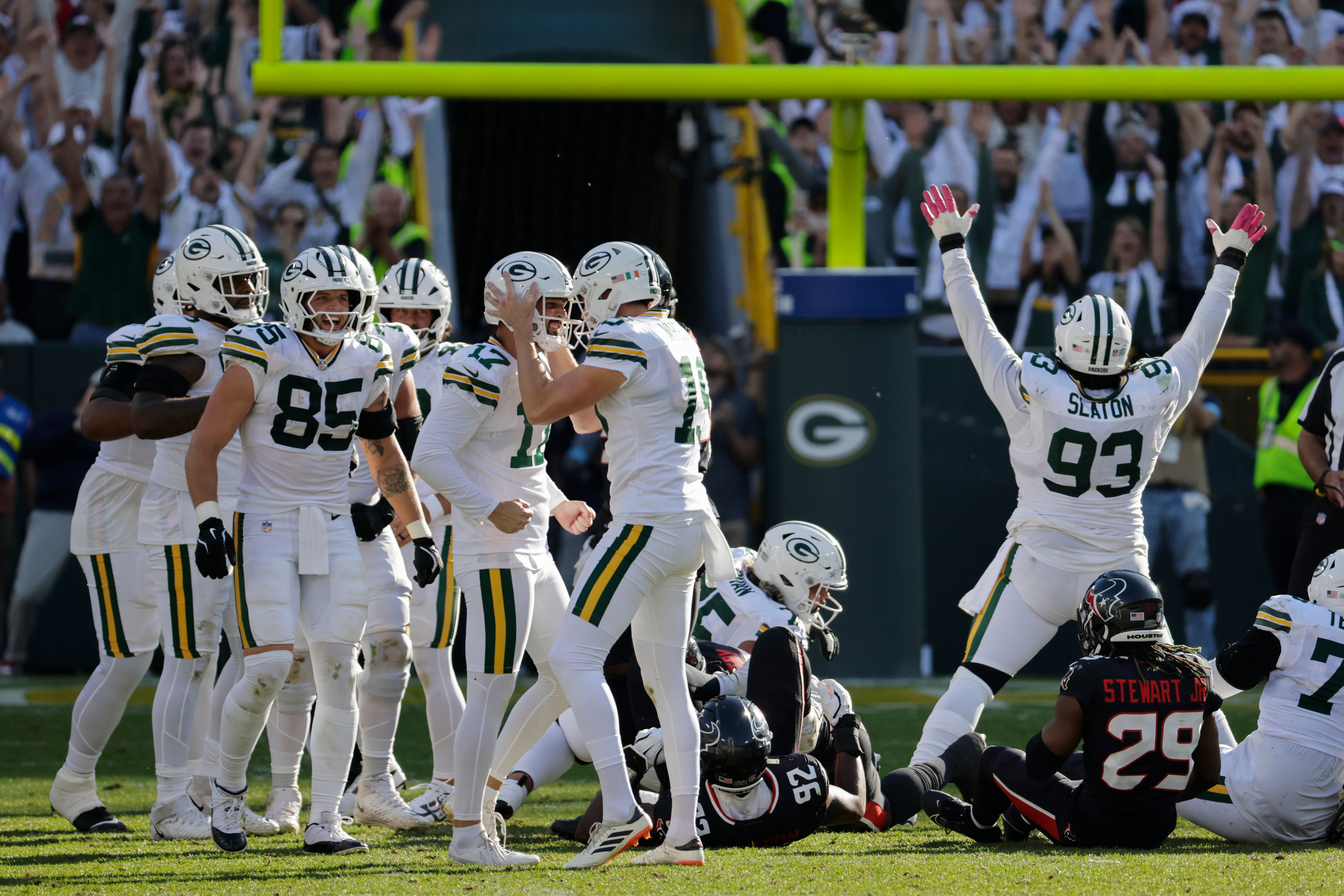 Green Bay Packers’ kicker Brandon McManus (17) celebrates with team-mates after kicking the game-winning field goal against the Houston Texans (Mike Roemer/AP)