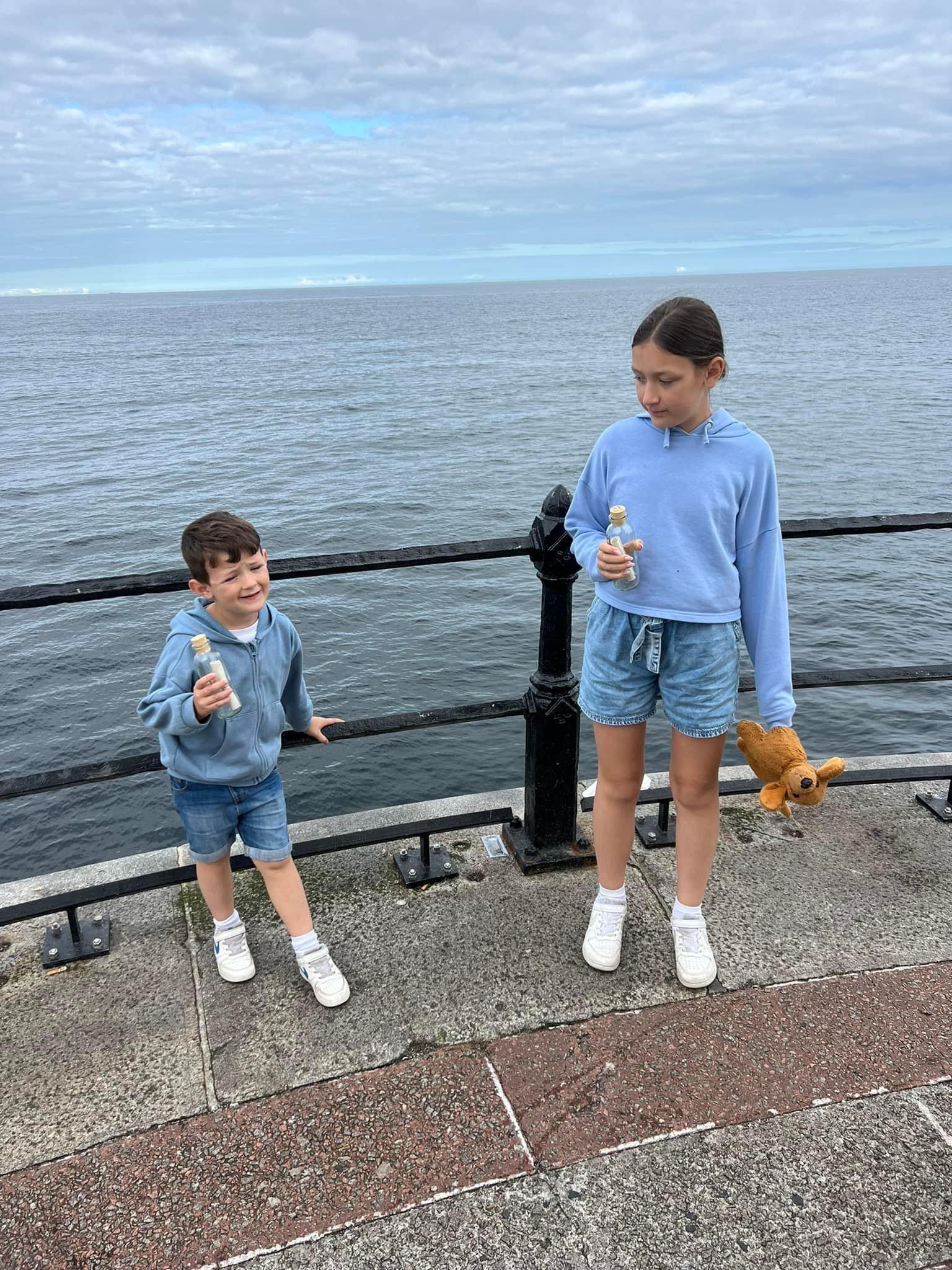 Harry and Grace Liddle on the day they threw their bottles off Roker Pier (Christie Bowley/PA)