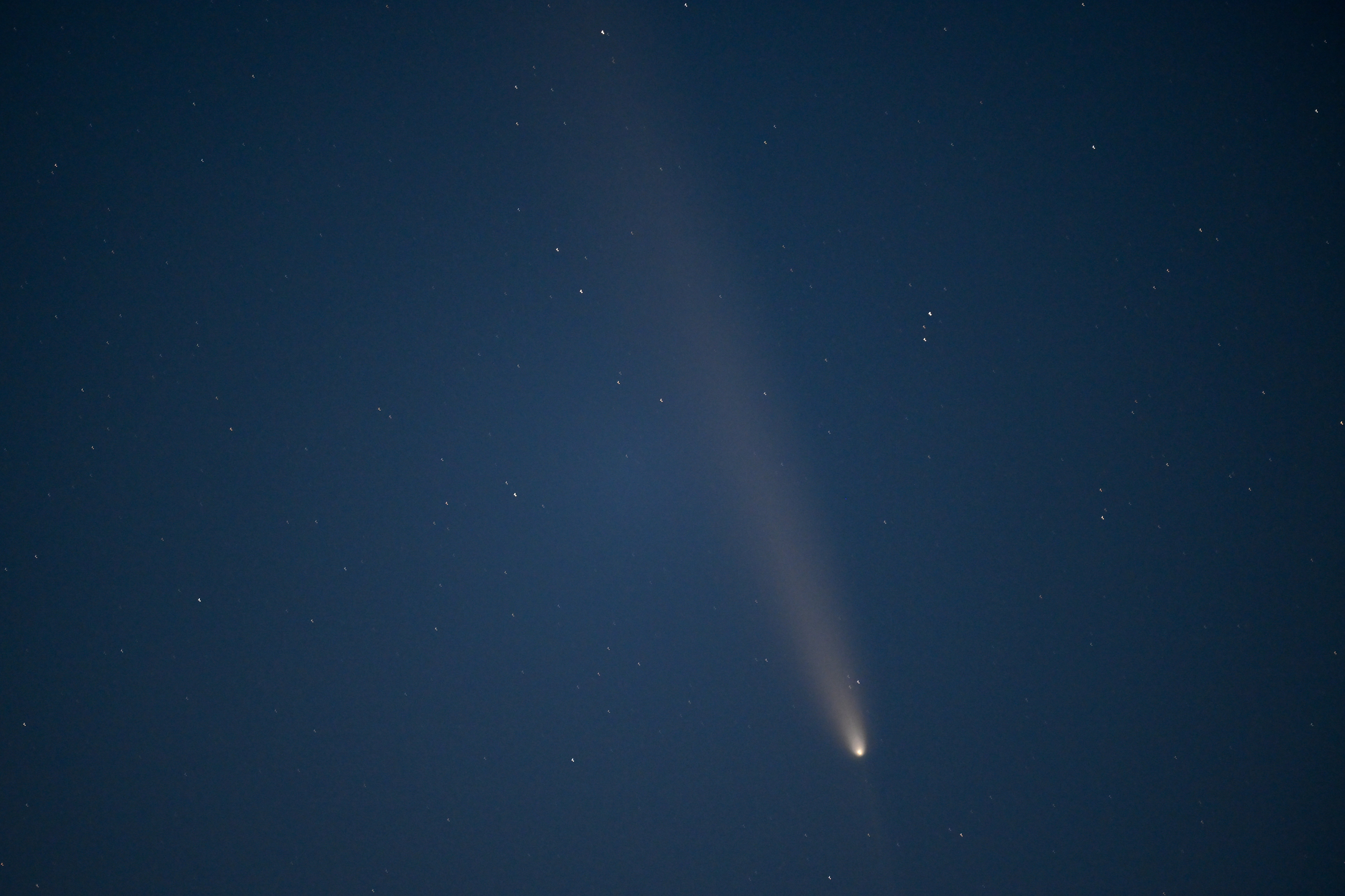 Comet Tsuchinshan-Atlas, the C/2023 A3 Tsuchinshan-Atlas comet, the brightest comet of the last 13 years is captured over Pacific Ocean in Pescadero, California, United States on October 16, 2024