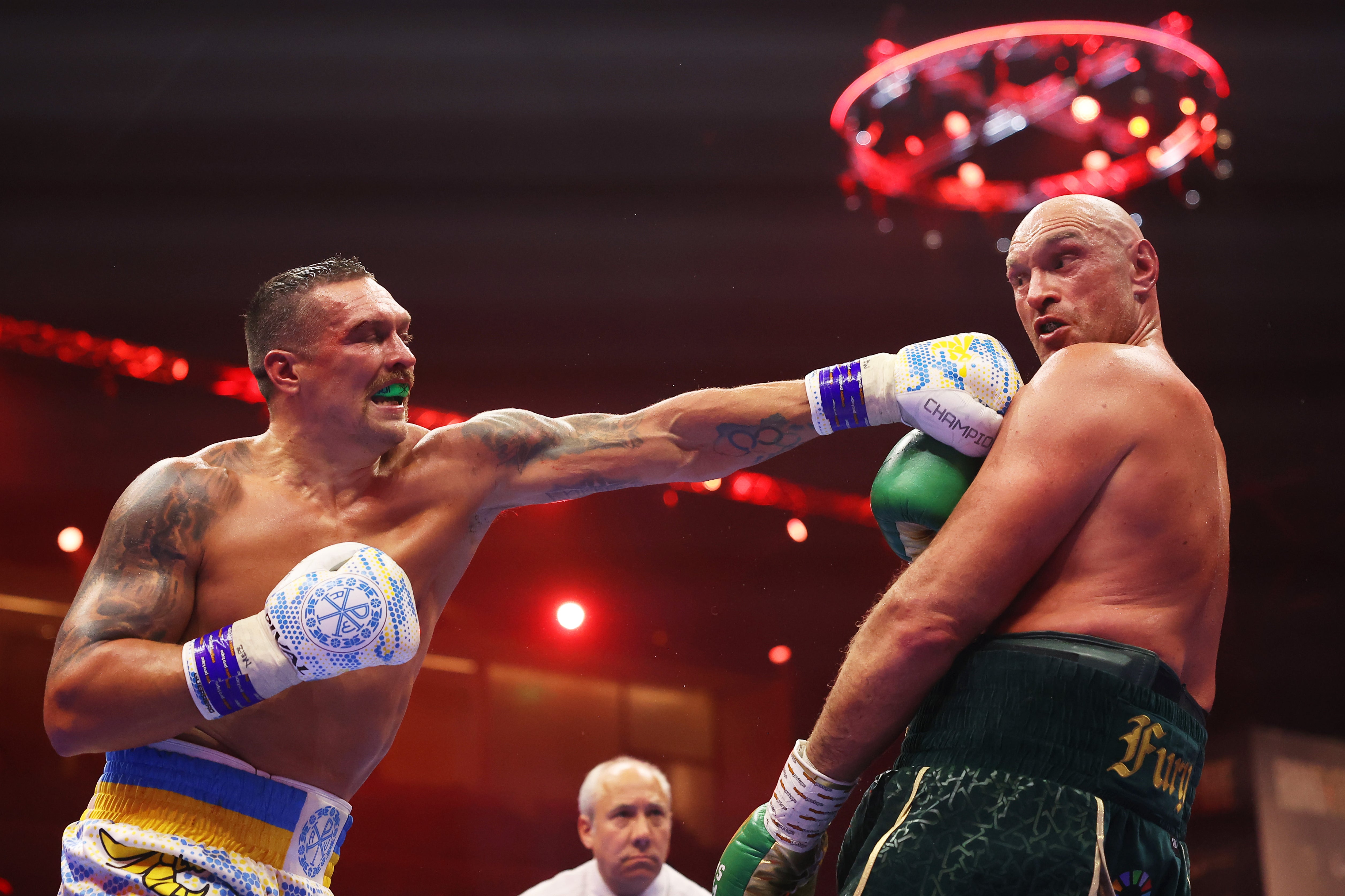 Oleksandr Usyk punches Tyson Fury