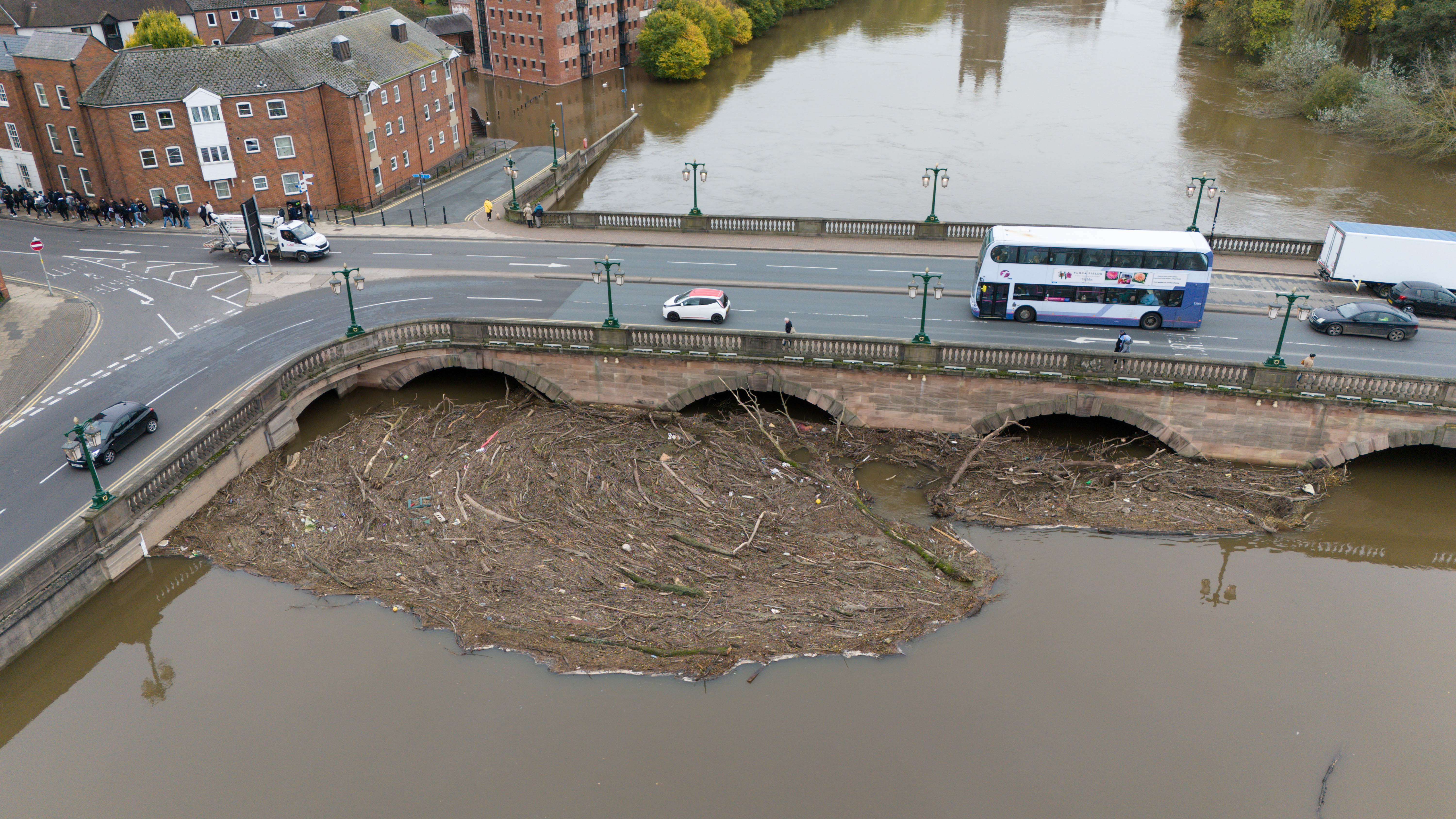 Debris by a bridge on the river Severn in Worcester