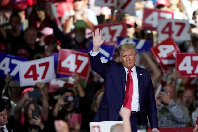 <p>Republican presidential nominee former President Donald Trump waves during a town hall in Lancaster, Pennsylvania. A new poll shows a number of Republicans believe he should do “whatever it takes” for him to get to the White House </p>