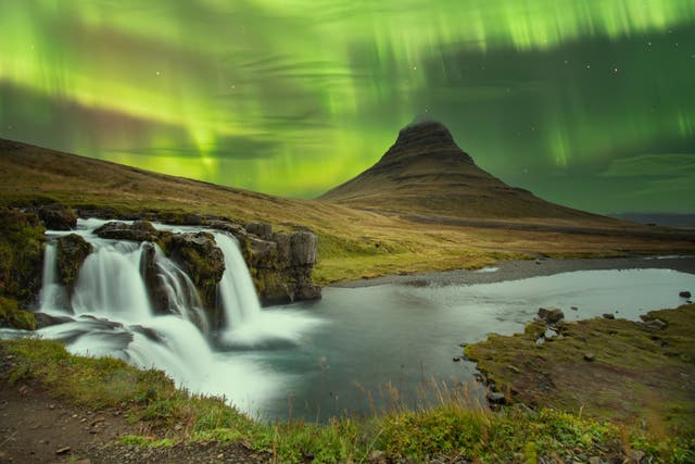 <p>Kirkjufell mountain is a popular spot for viewing the Northern Lights </p>