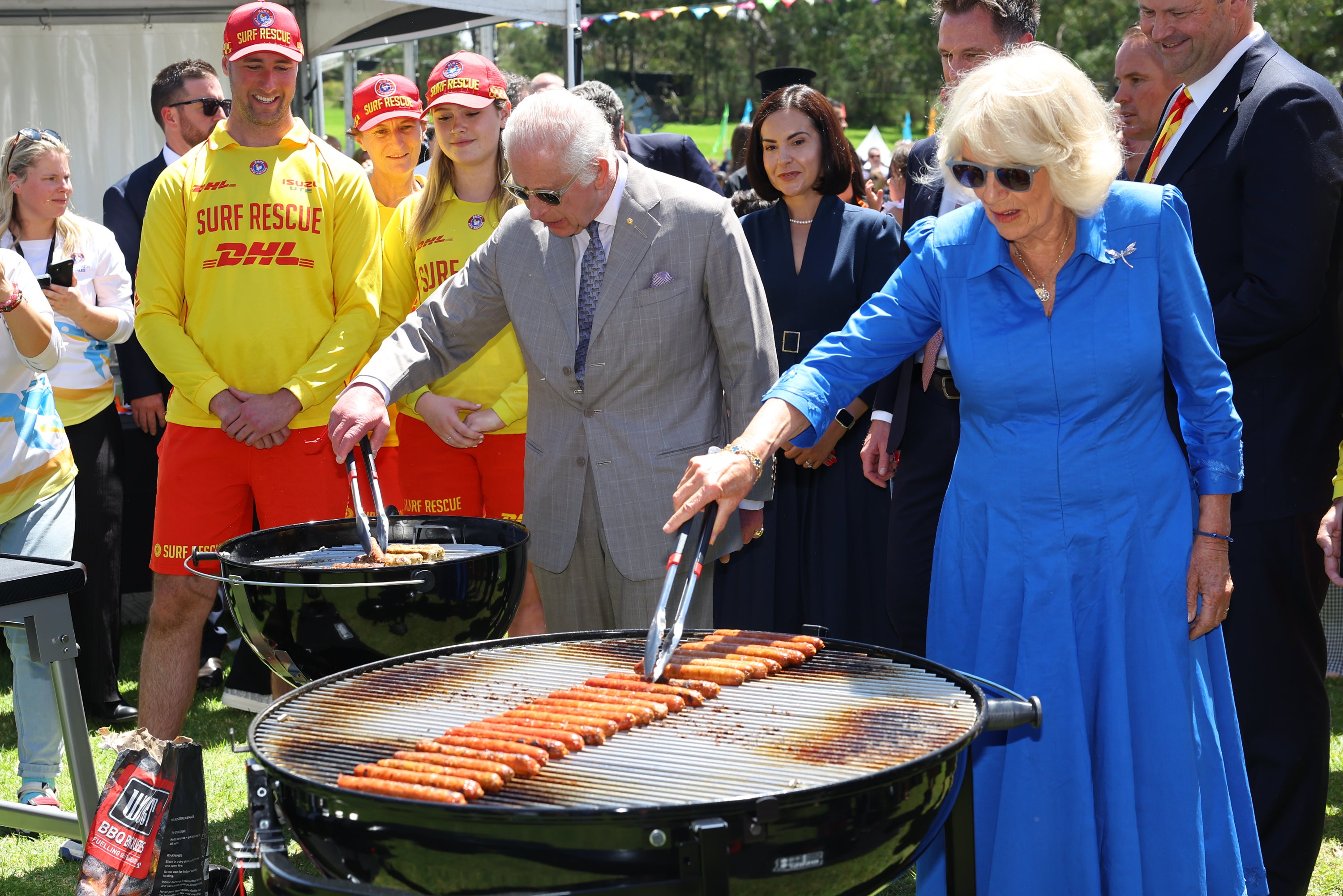 The royals did not pass up the opportunity to help cook at the Sydney barbecue.