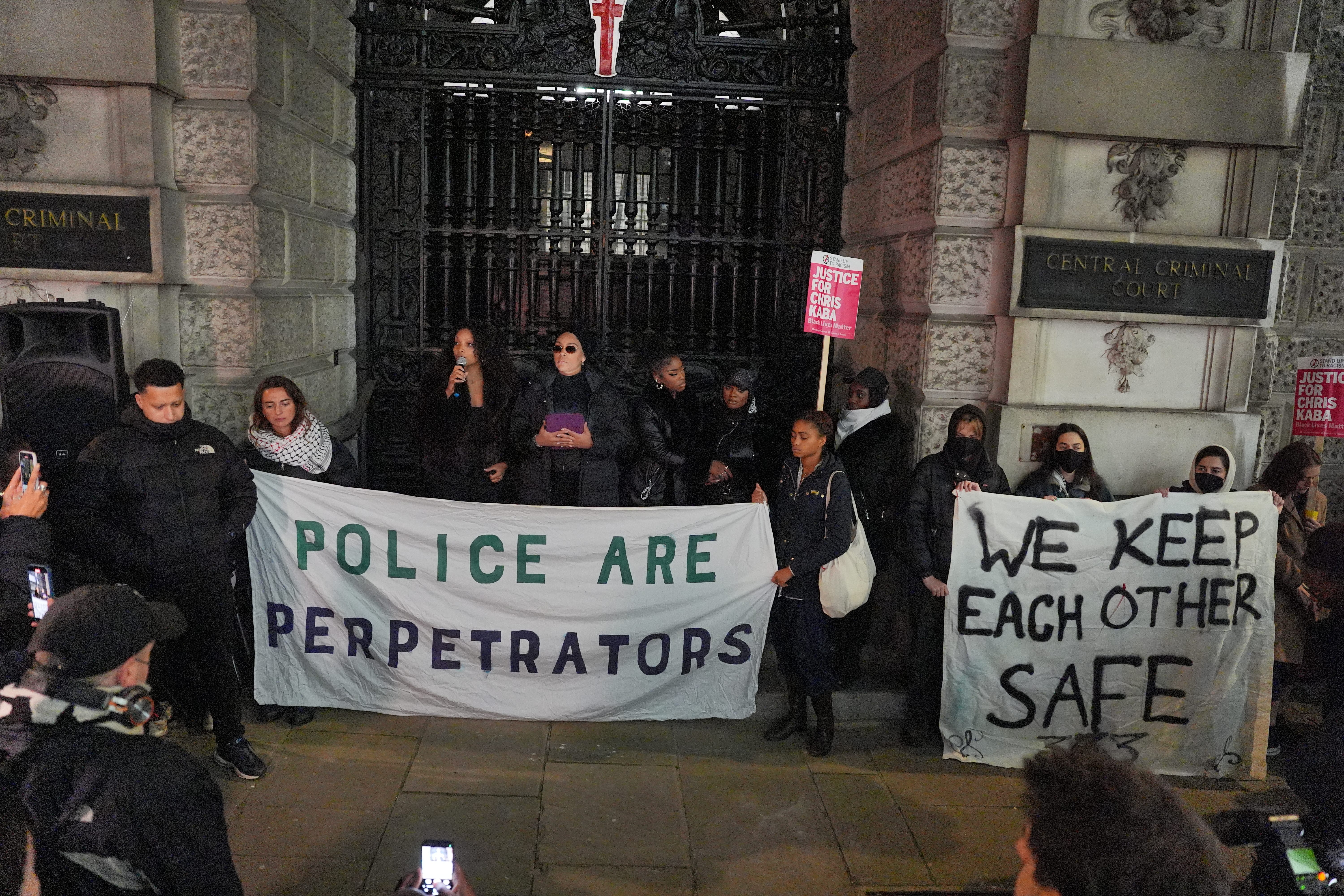 Temi Mawale, Kayza Rose, Sheeda Queen along with friends and family of Chris Kaba demonstrate outside the Old Bailey(Jordan Pettitt/PA)