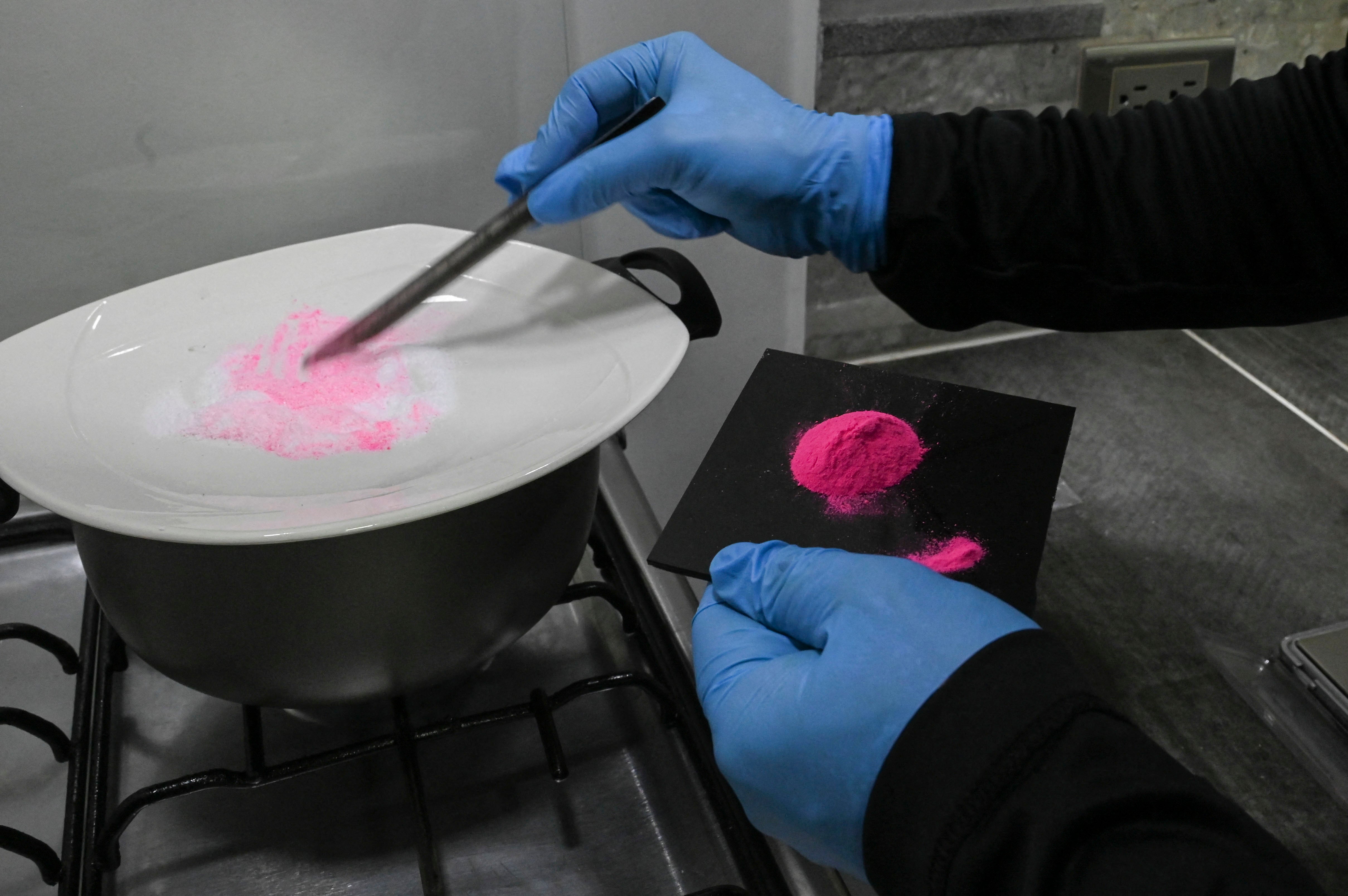 A man prepare pink cocaine in Colombia, April 2022