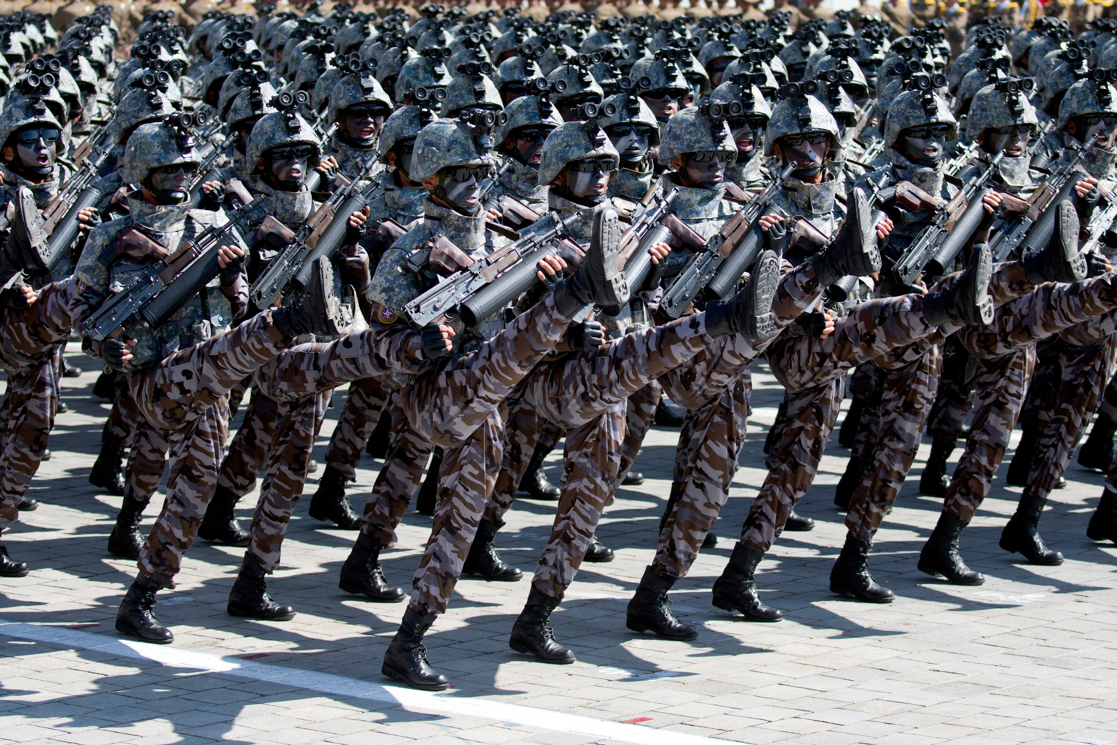 Soldiers march in a parade during celebrations marking the 70th anniversary of North Korea's founding day in Pyongyang in 2018