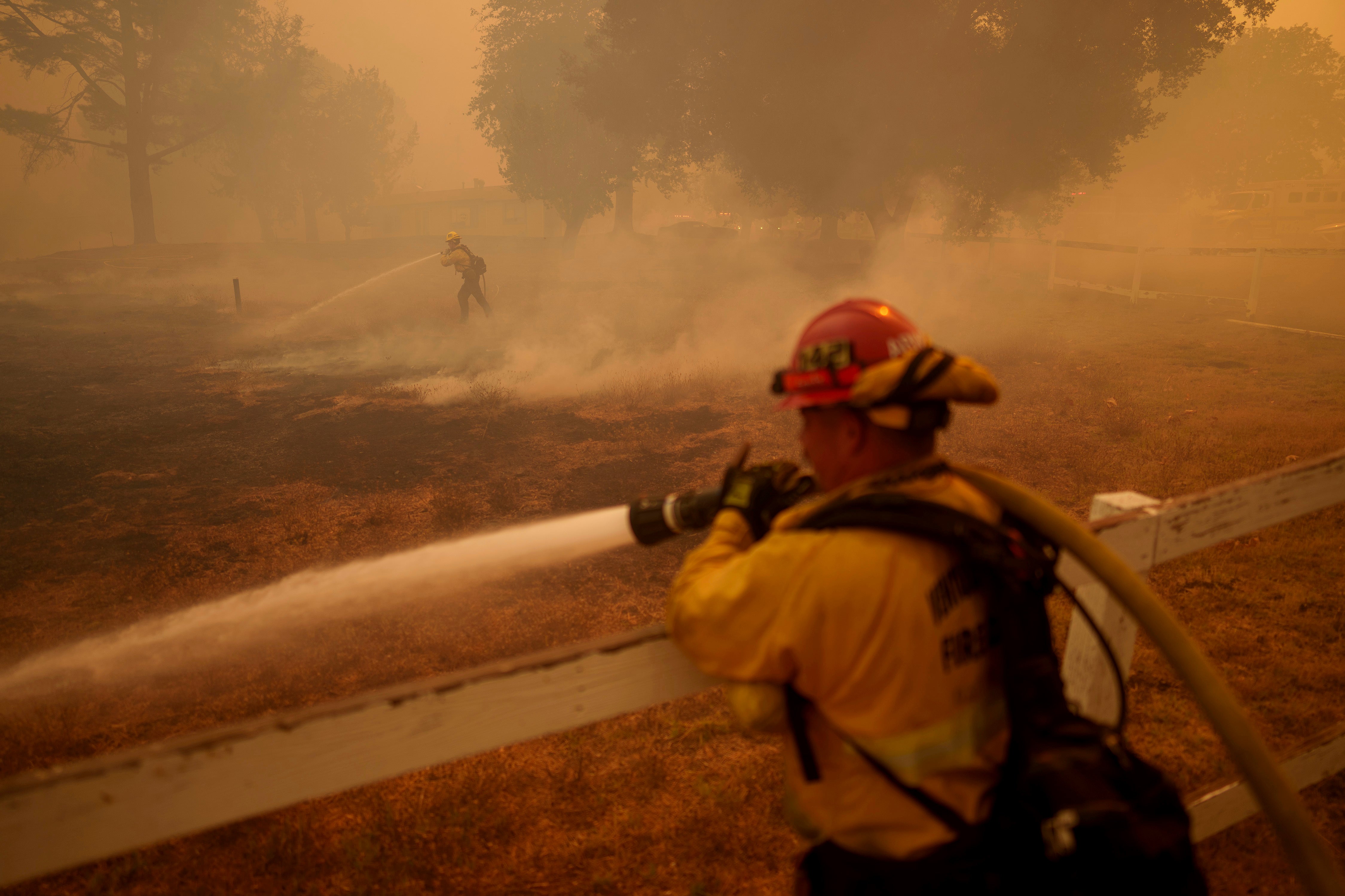 Firefighters work against the Felicia fire in southern California earlier this month. Wildfire-related deaths attributable to climate change have increased over the last 60 years, researchers said this week