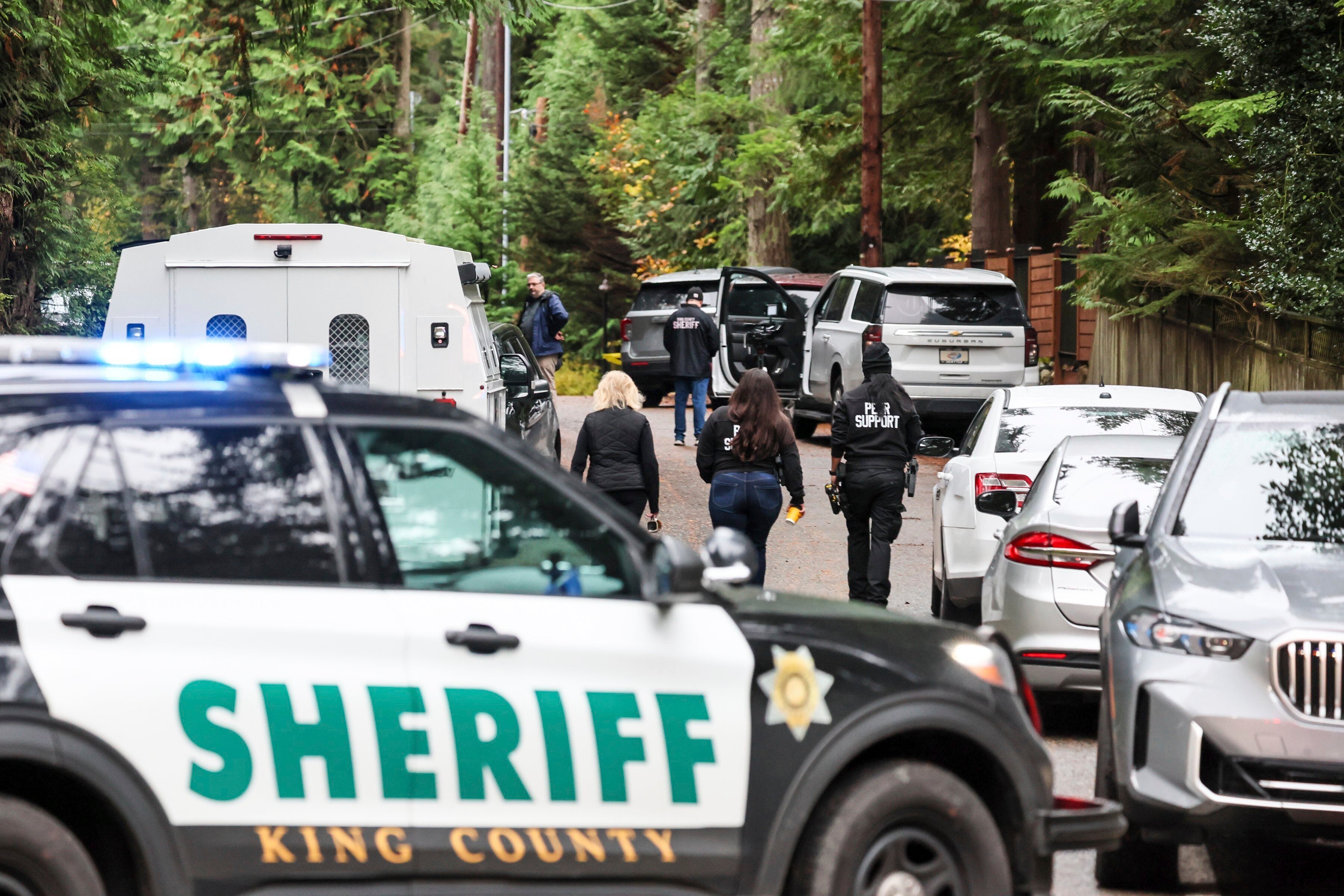 Police arrive on the scene of a shooting in Fall City, Washington, Monday, Oct. 21, 2024. Five people were found killed inside of a home in what is being described as a ‘family incident’