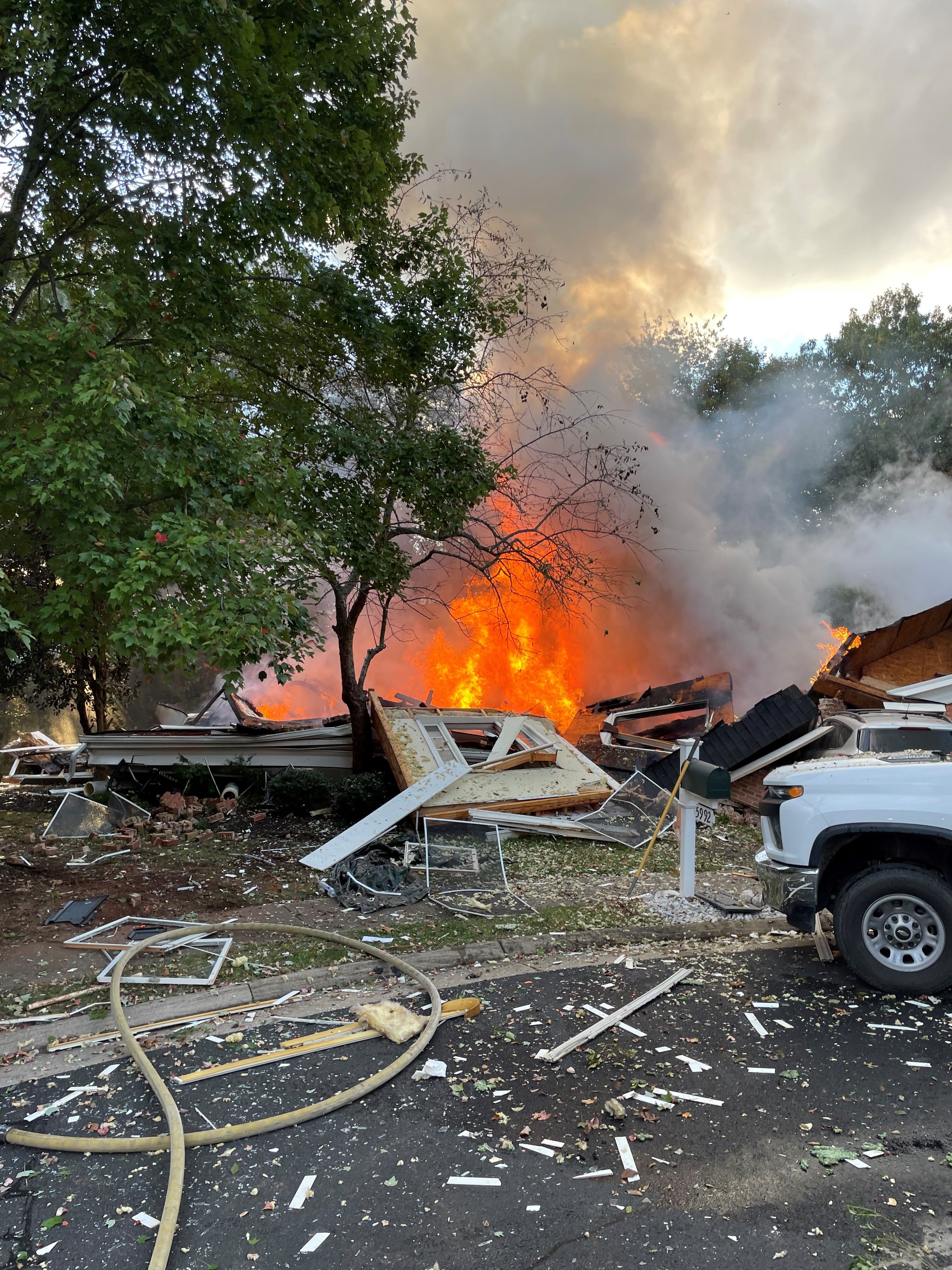 Flames engulfed the property on Coby Hunt Court, Haymarket on Tuesday 15 after a gas line was suddenly struck and ruptured sparking an explosion, officials said