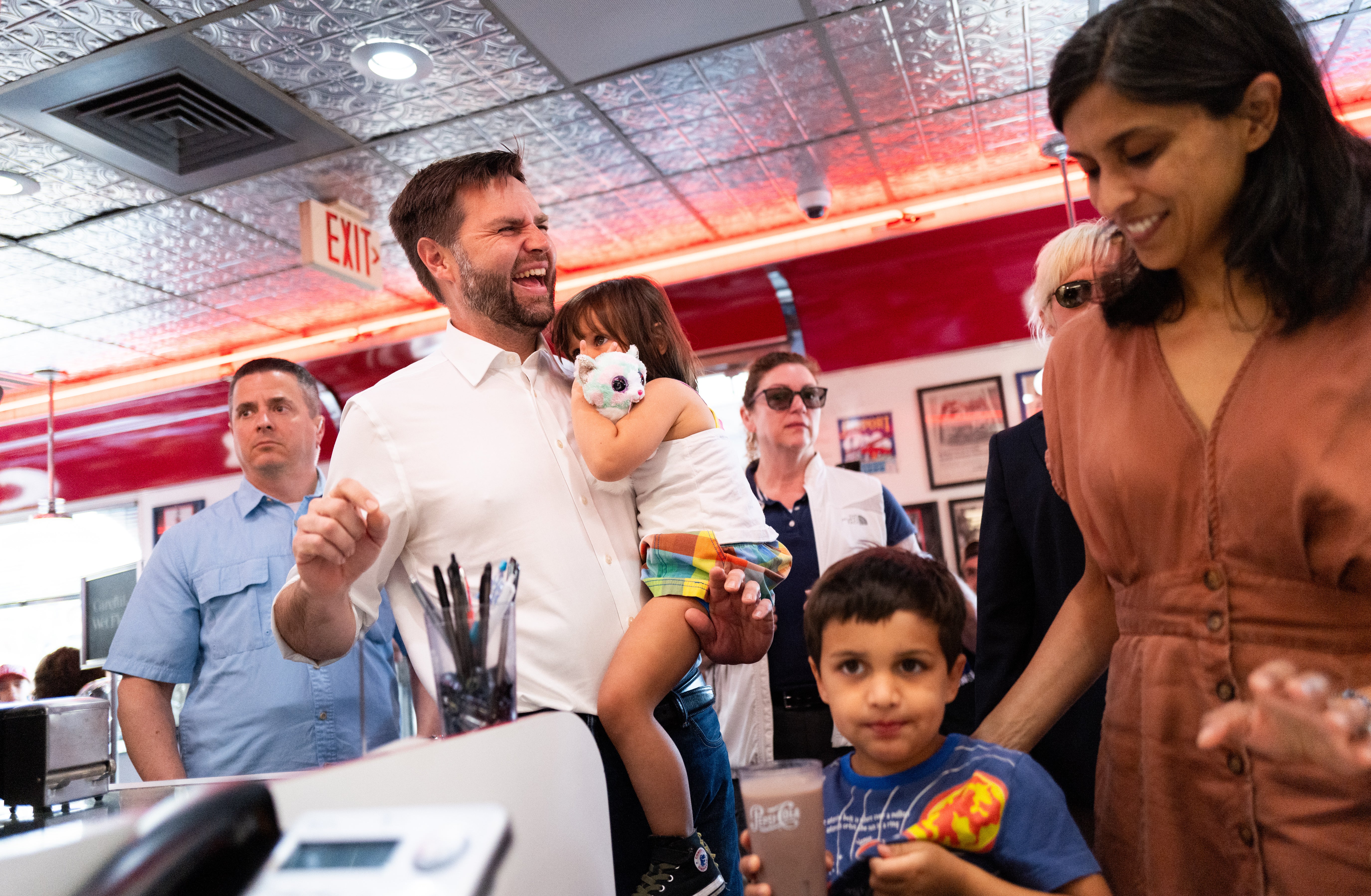 JD Vance, Usha Vance and two of their children at a campaign stop in Minnesota