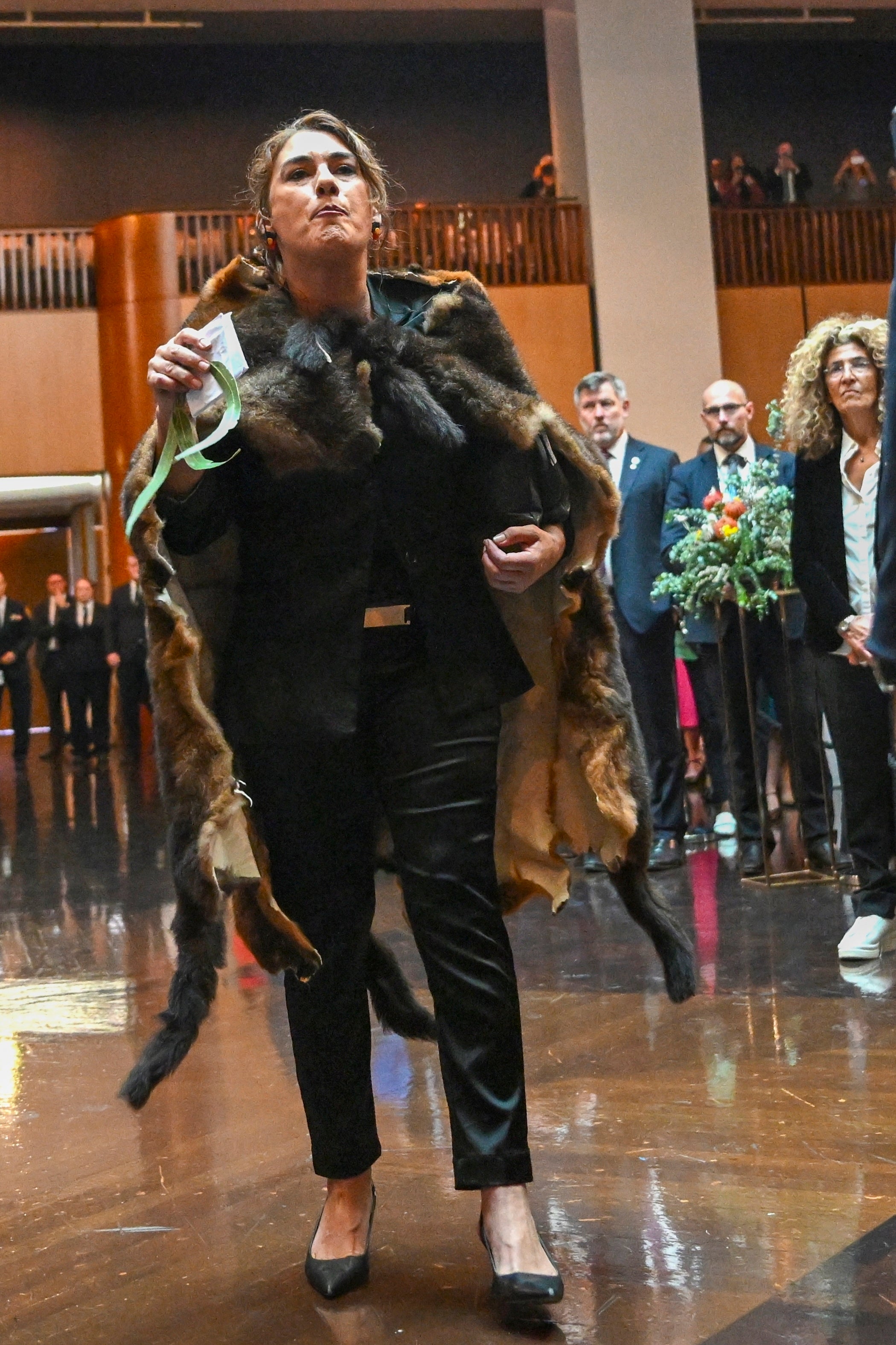 Australian Senator Lidia Thorpe disrupts proceedings as Britain's King Charles and Queen Camilla attend a Parliamentary reception hosted by Australian Prime Minister Anthony Albanese and partner Jodie Jaydon at Parliament House in Canberra, Australia, Monday, Oct. 21, 2024