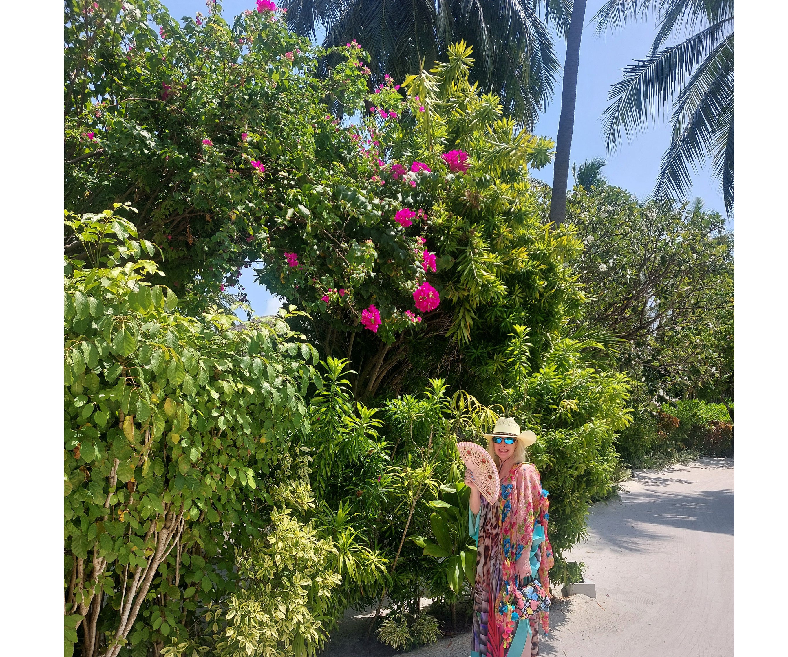 Sam on sandy path and enjoying the natural beauty beautiful at Velassaru Maldives