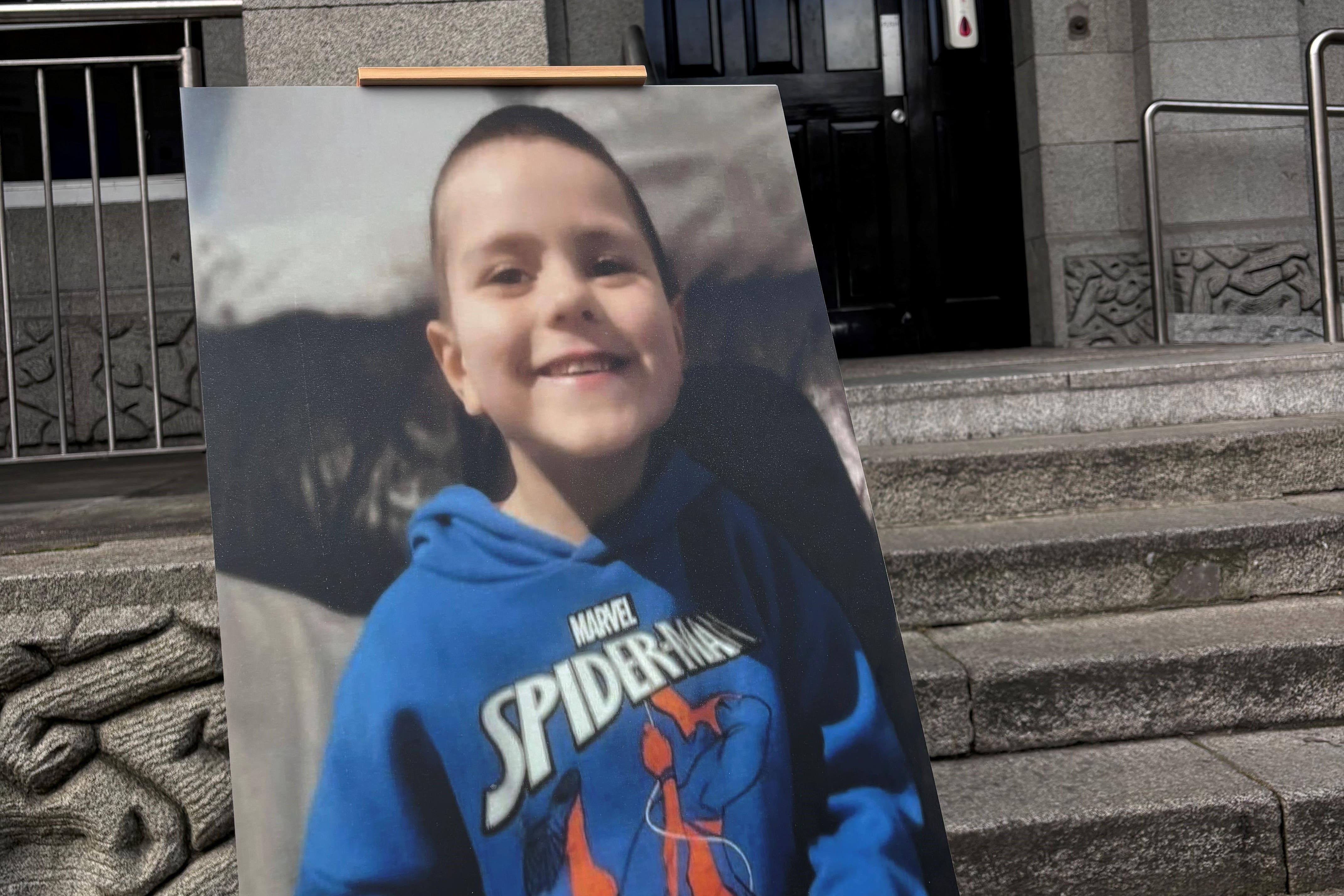 A photo of missing Kyran Durnin on display outside Dundalk Garda Station (Cate McCurry/PA)