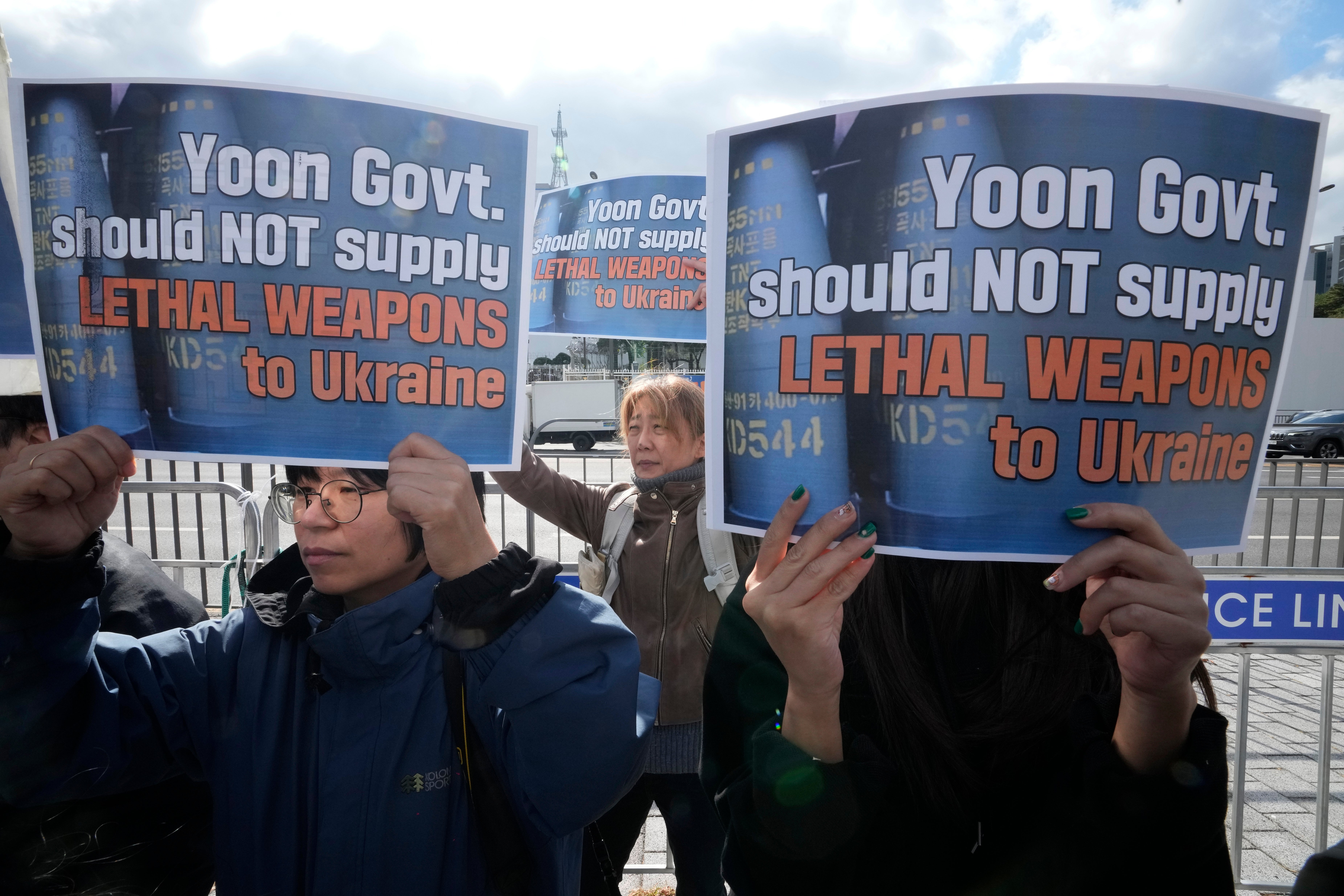 South Korean protesters stage a rally against their government's plans to supply lethal weapons to Ukraine,