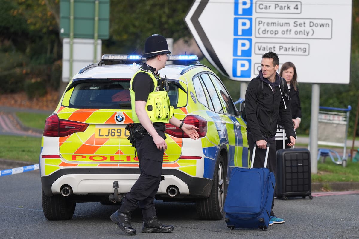 A bomb scare forces hundreds to evacuate Birmingham Airport as flights are delayed for hours