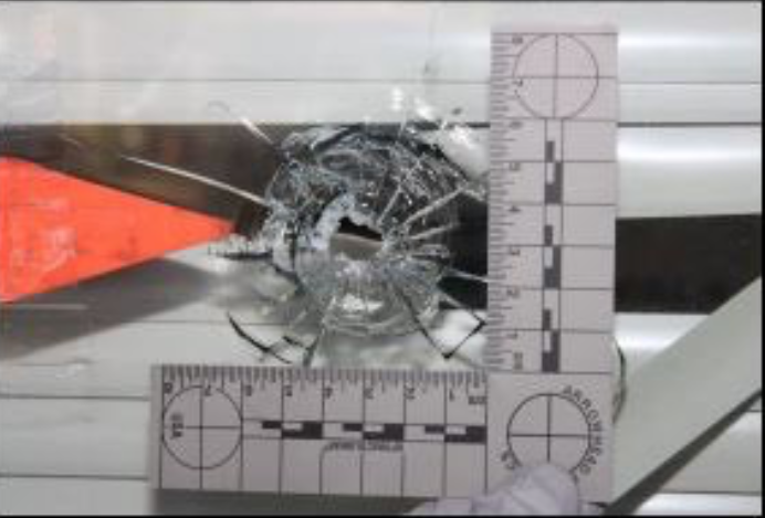 Photo of a bullet hole shot into the Tempe DNC Office in the battleground state of Arizona. The suspect behind the attacks at the building has been arrested