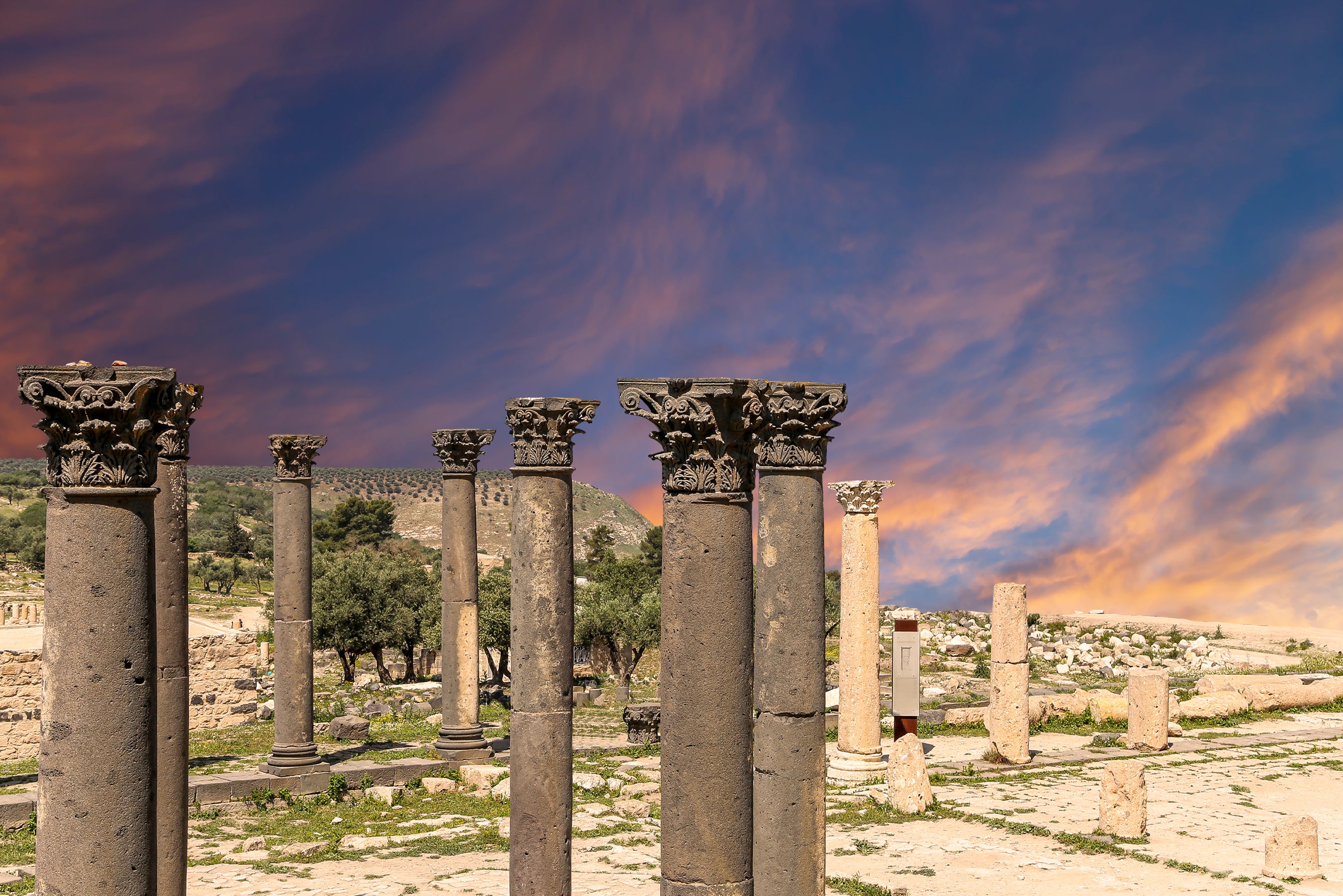 Explore the anincent black basalt ruins of Umm Qais