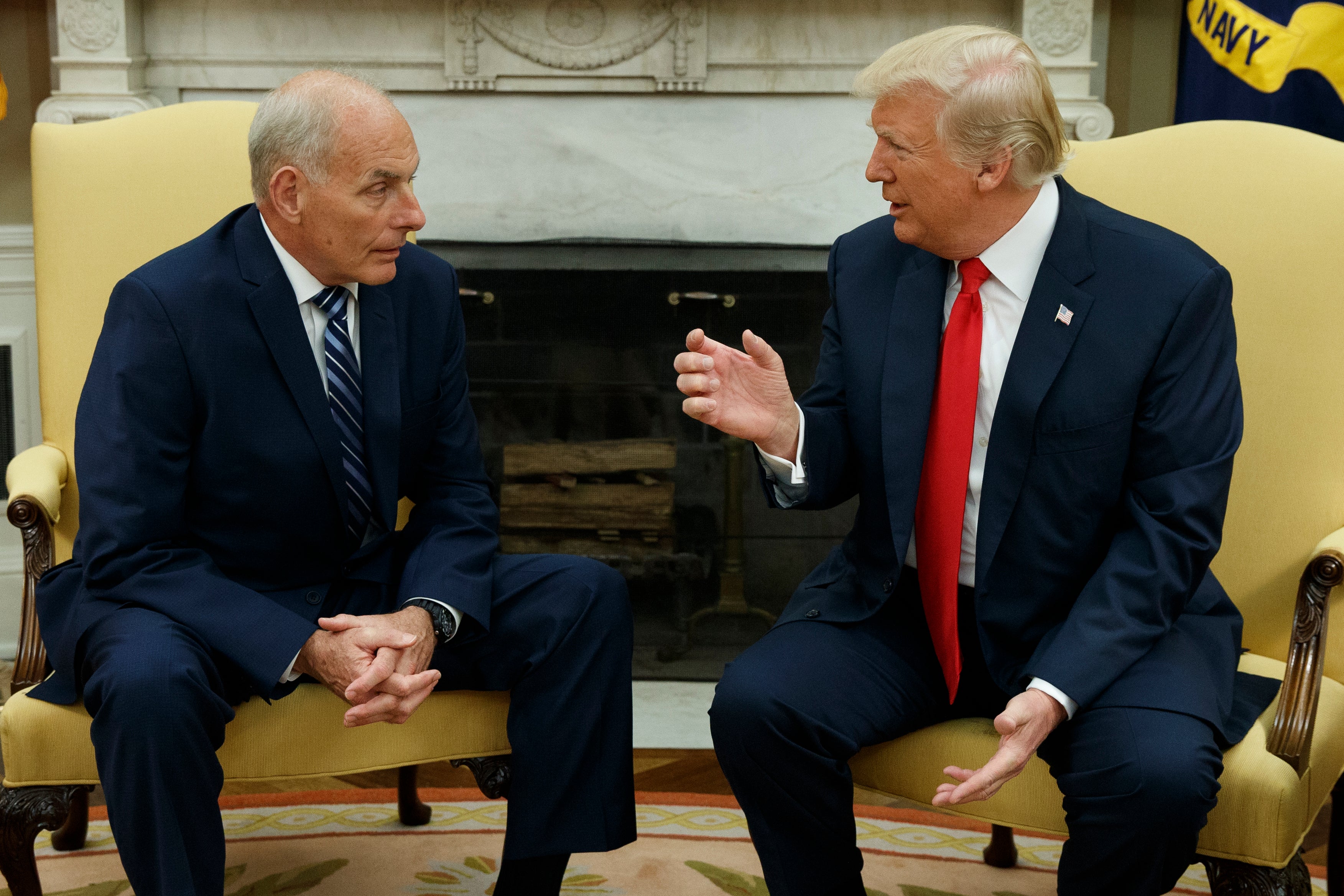 Trump talks with then-White House Chief of Staff John Kelly in the Oval Office on July 31, 2017. Kelly has sounded the alarm about comments Trump made about Hitler