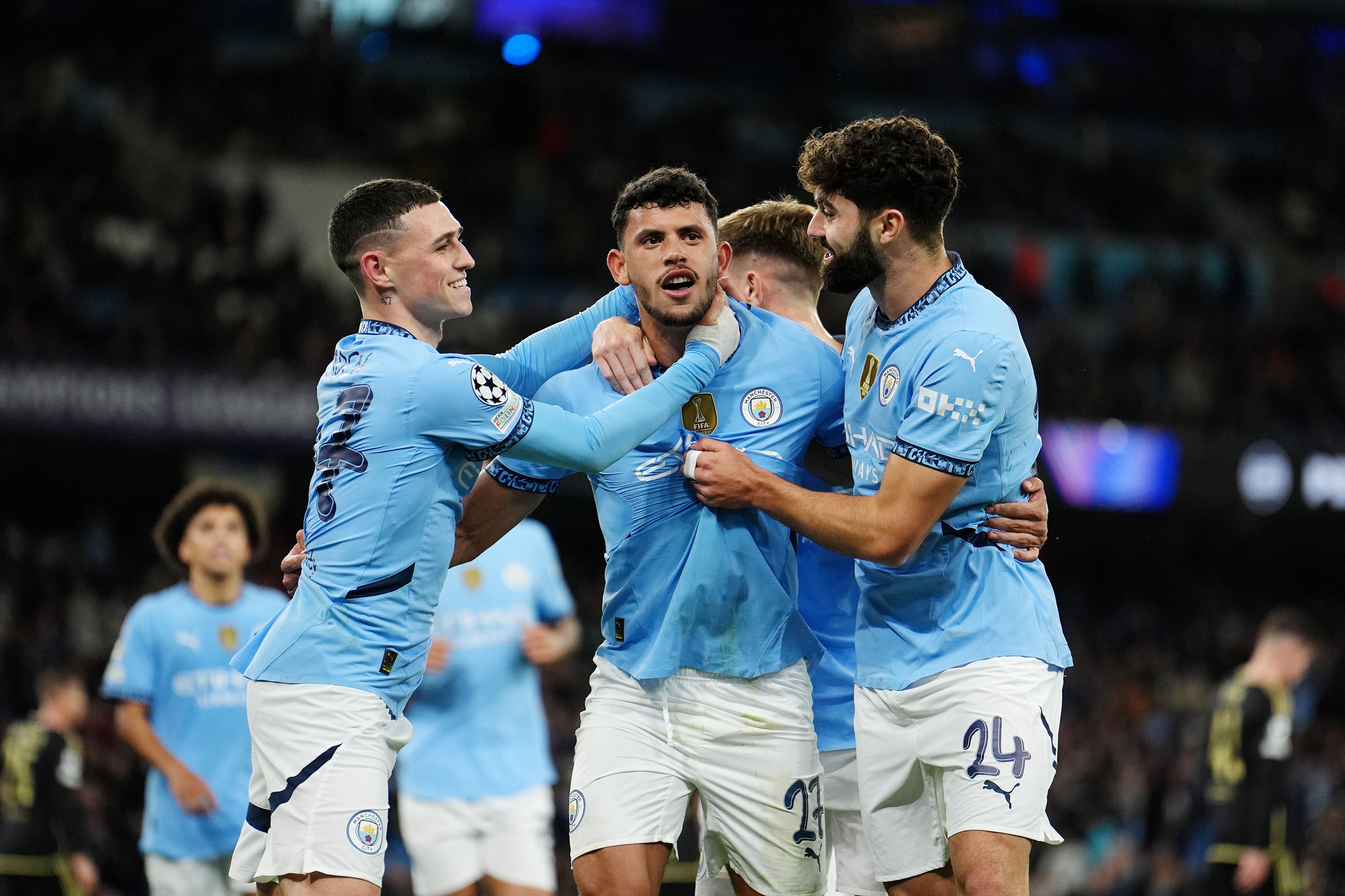 Matheus Nunes, centre, celebrates with teammates after scoring the fifth goal for City