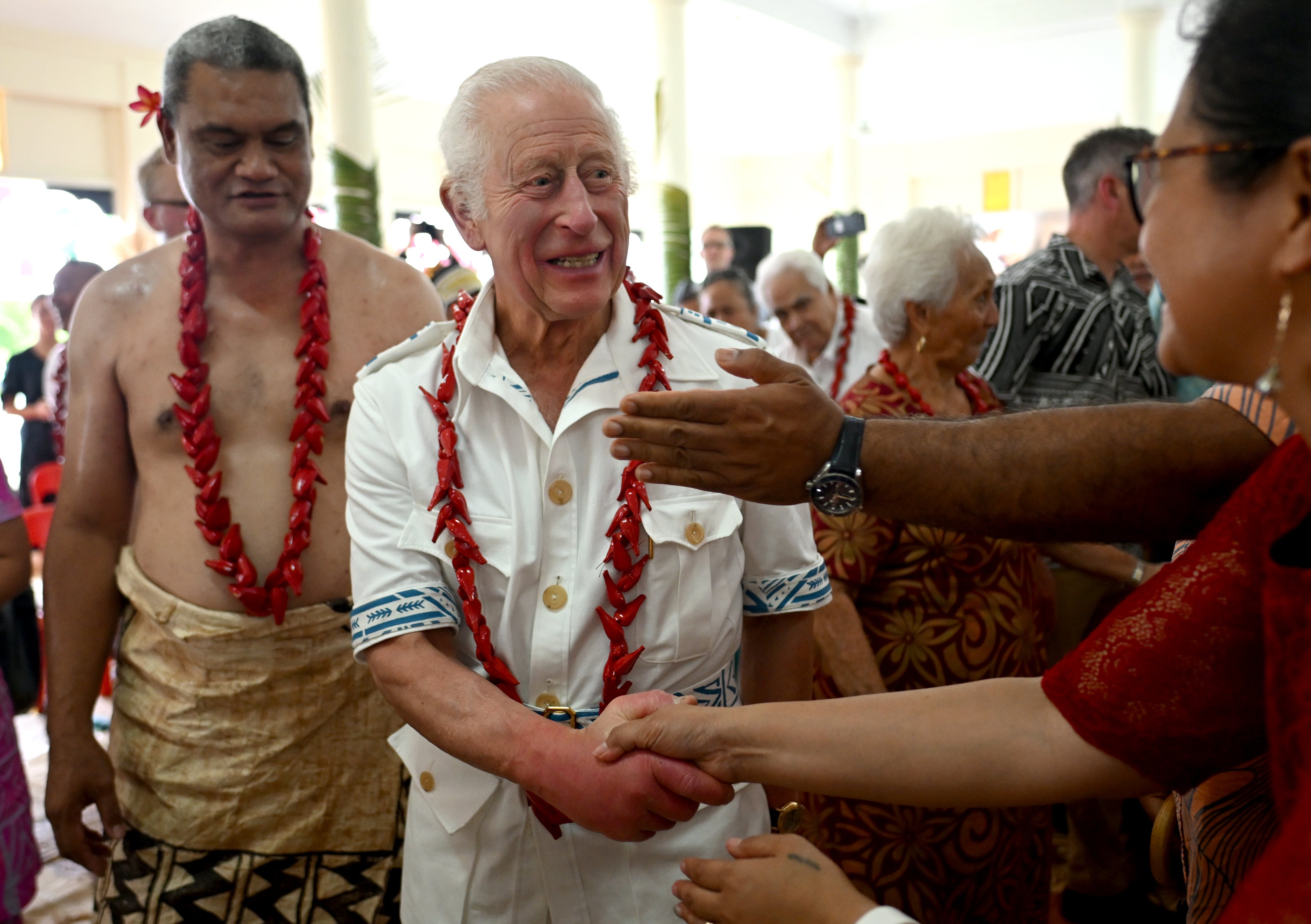 King Charles is greeted as he arrives for a traditional ‘ava ceremonial welcome during a visit to Moata’a Church Hall in Samoa, on day five of the royal visit to Australia and Samoa