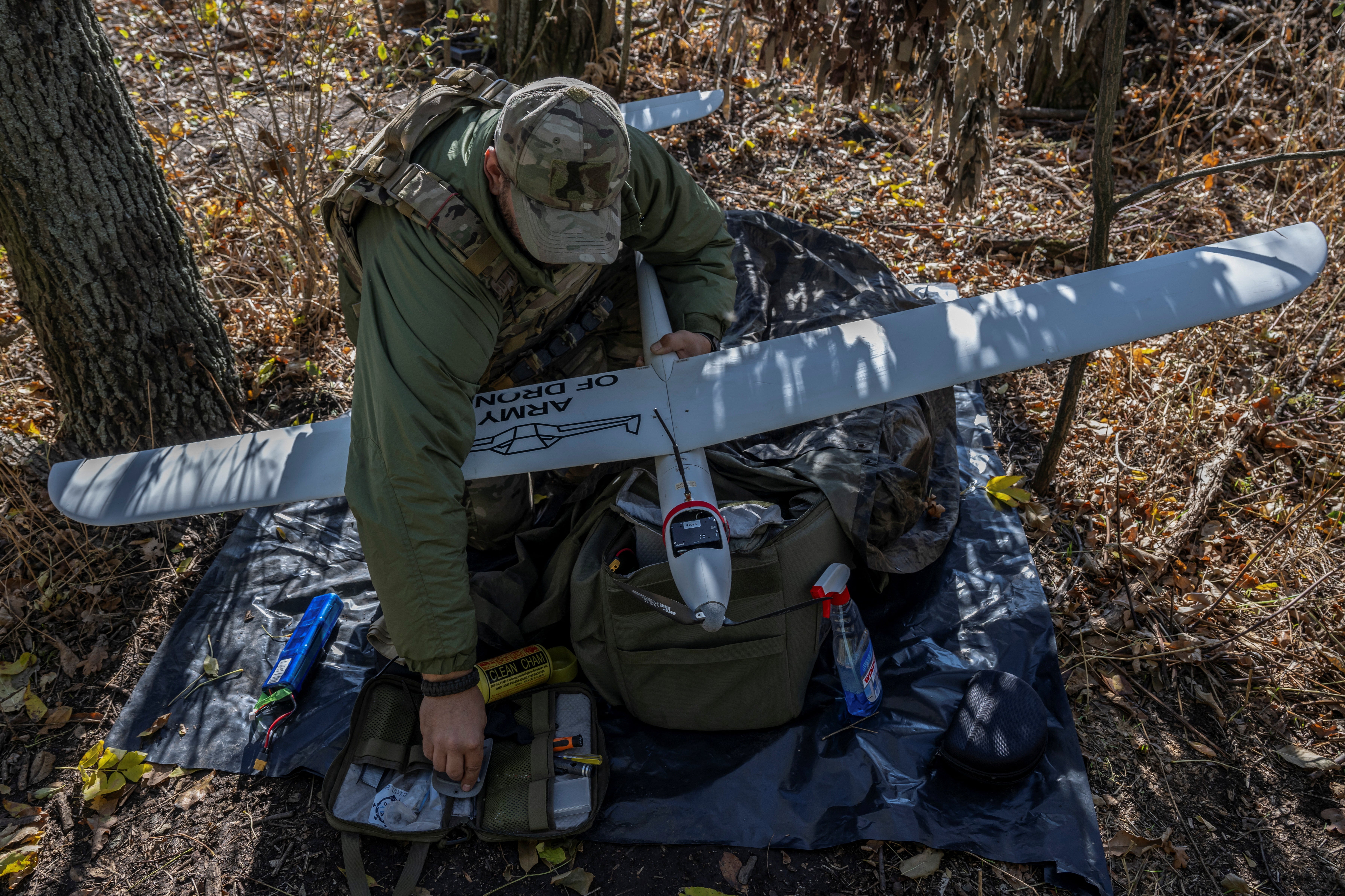 A Ukrainian serviceman of the 12th Azov Special Purpose Brigade of the National Guard of Ukraine prepares to fly a Mara reconnaissance unmanned aerial vehicle at a position