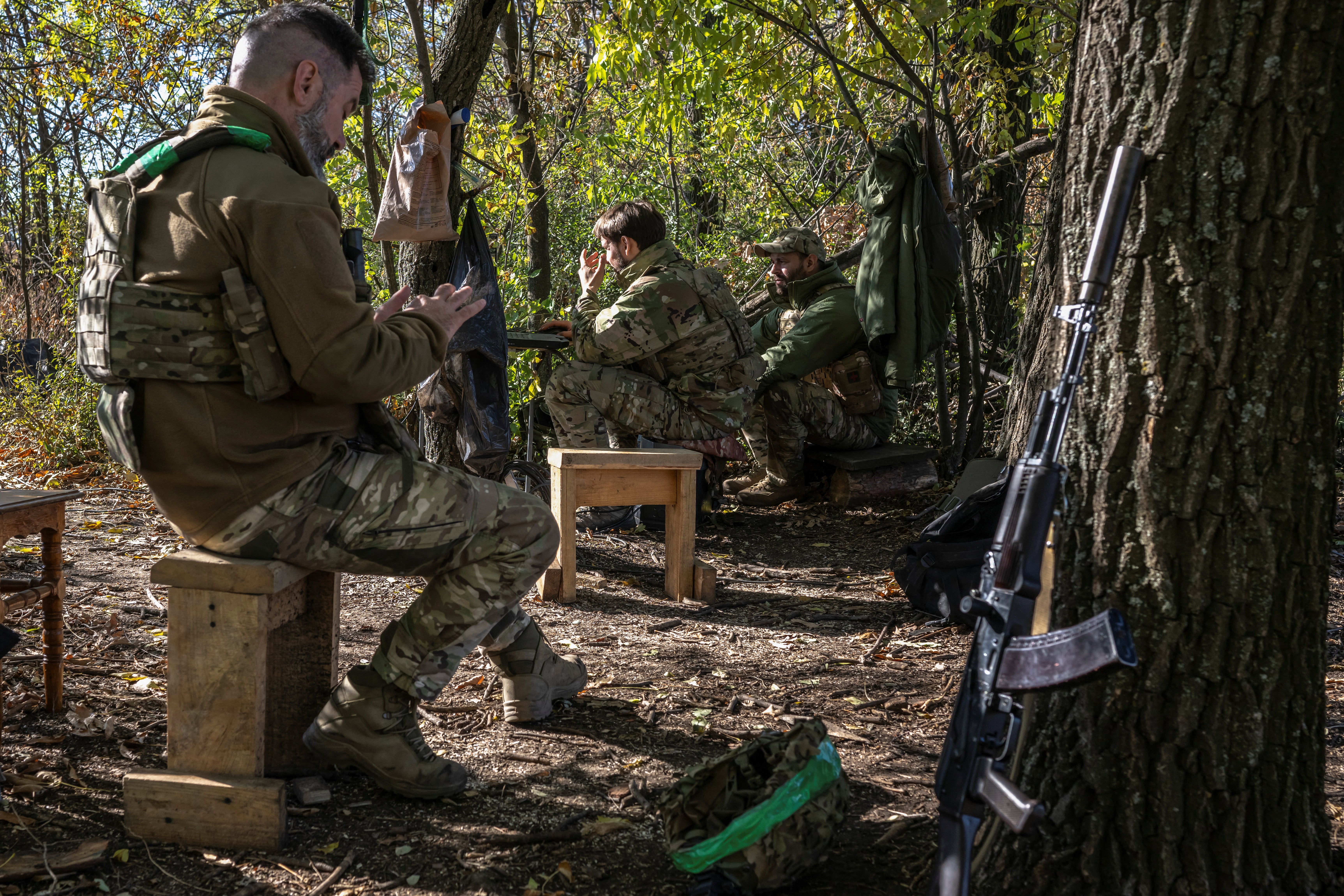 Ukrainian servicemen of the 12th Azov Special Purpose Brigade of the National Guard of Ukraine sit in camp near the town of Toretsk