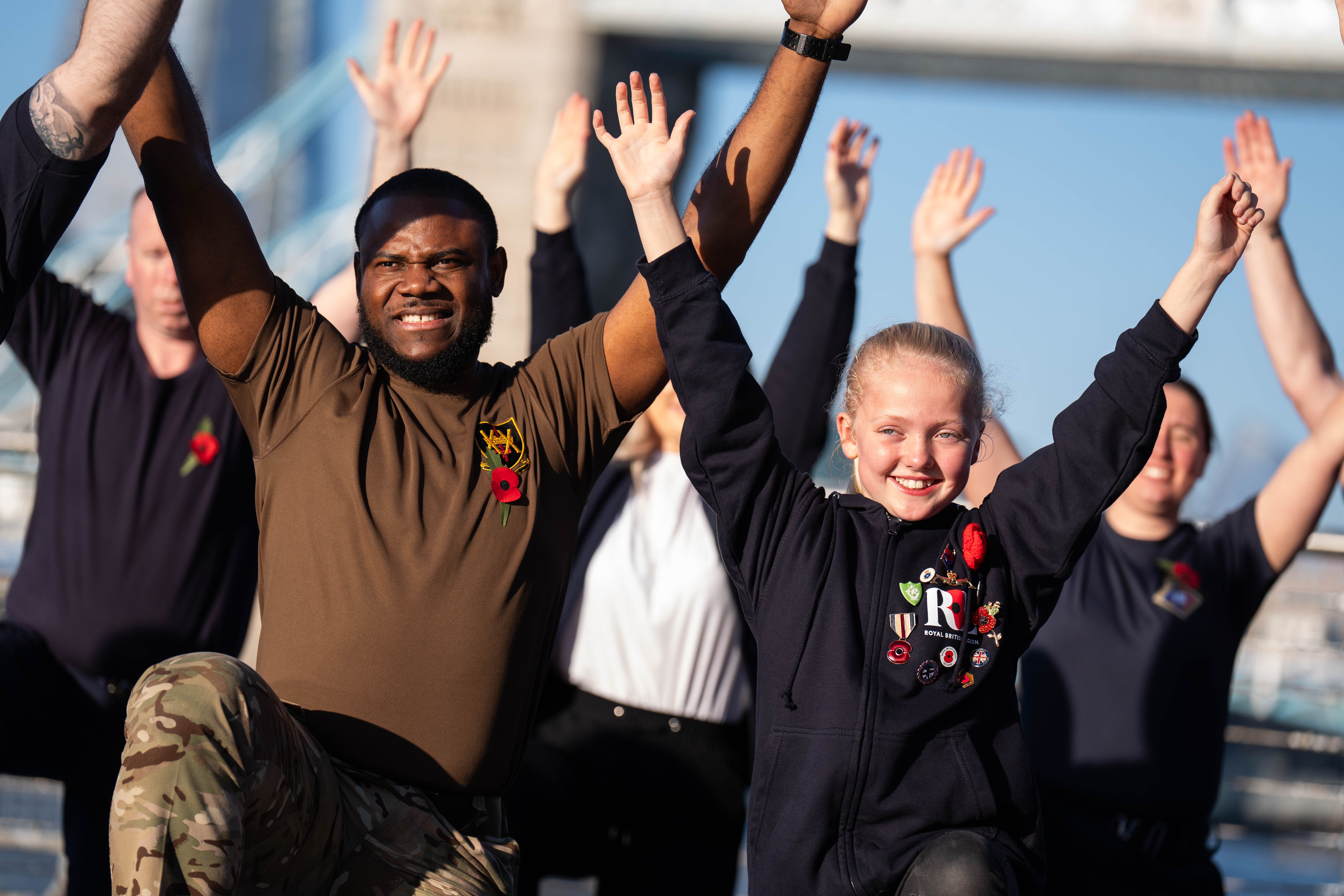 Ruby Sheffield (right) joined service personnel and veterans from across the generations for a mindfulness session to mark the launch of the Royal British Legion Poppy Appeal 2024 at HMS President, St Katharine Docks Marina in London (James Manning/PA)