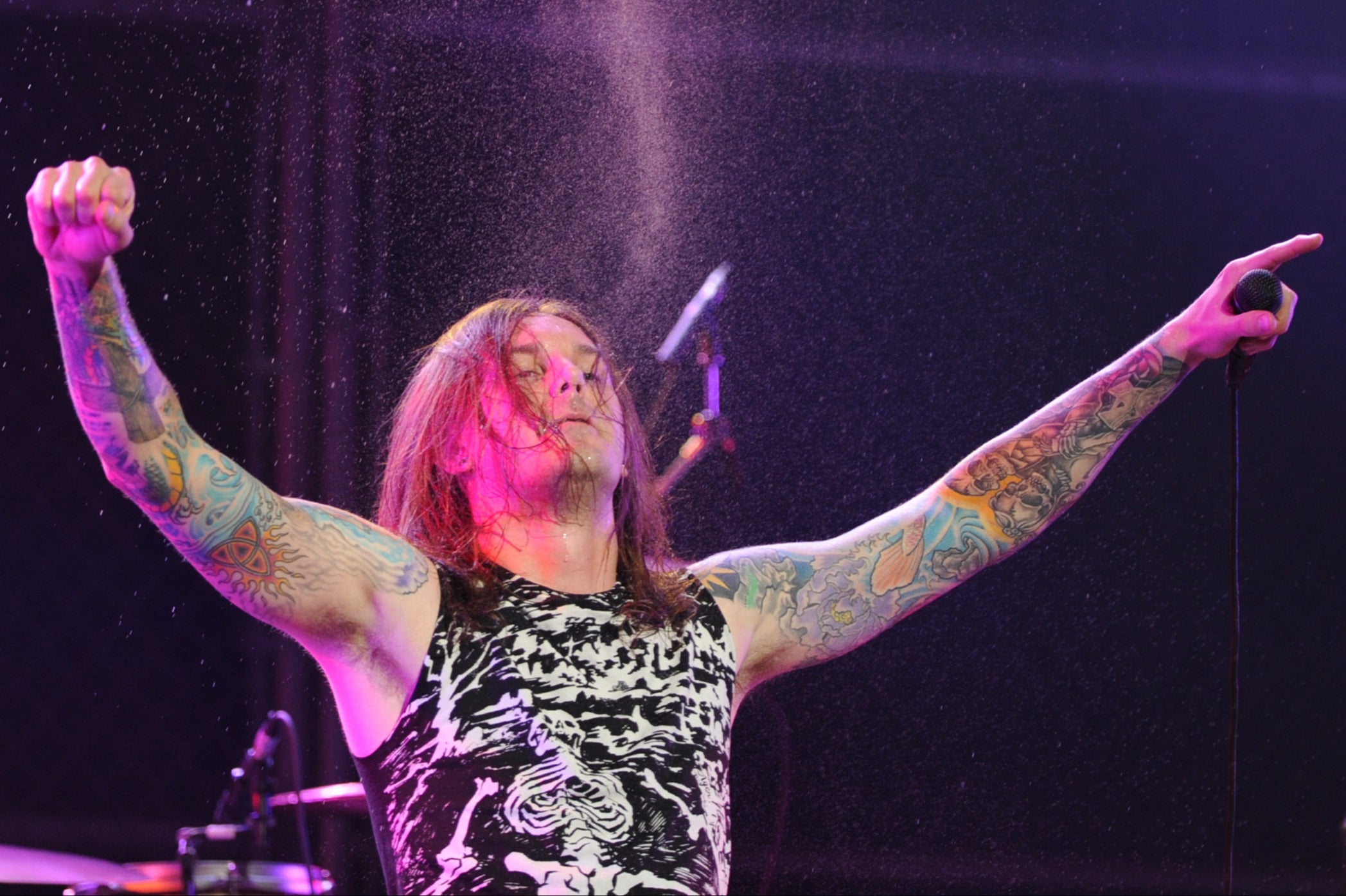 As I Lay Dying frontman Tim Lambesis performing in Los Angeles in 2010