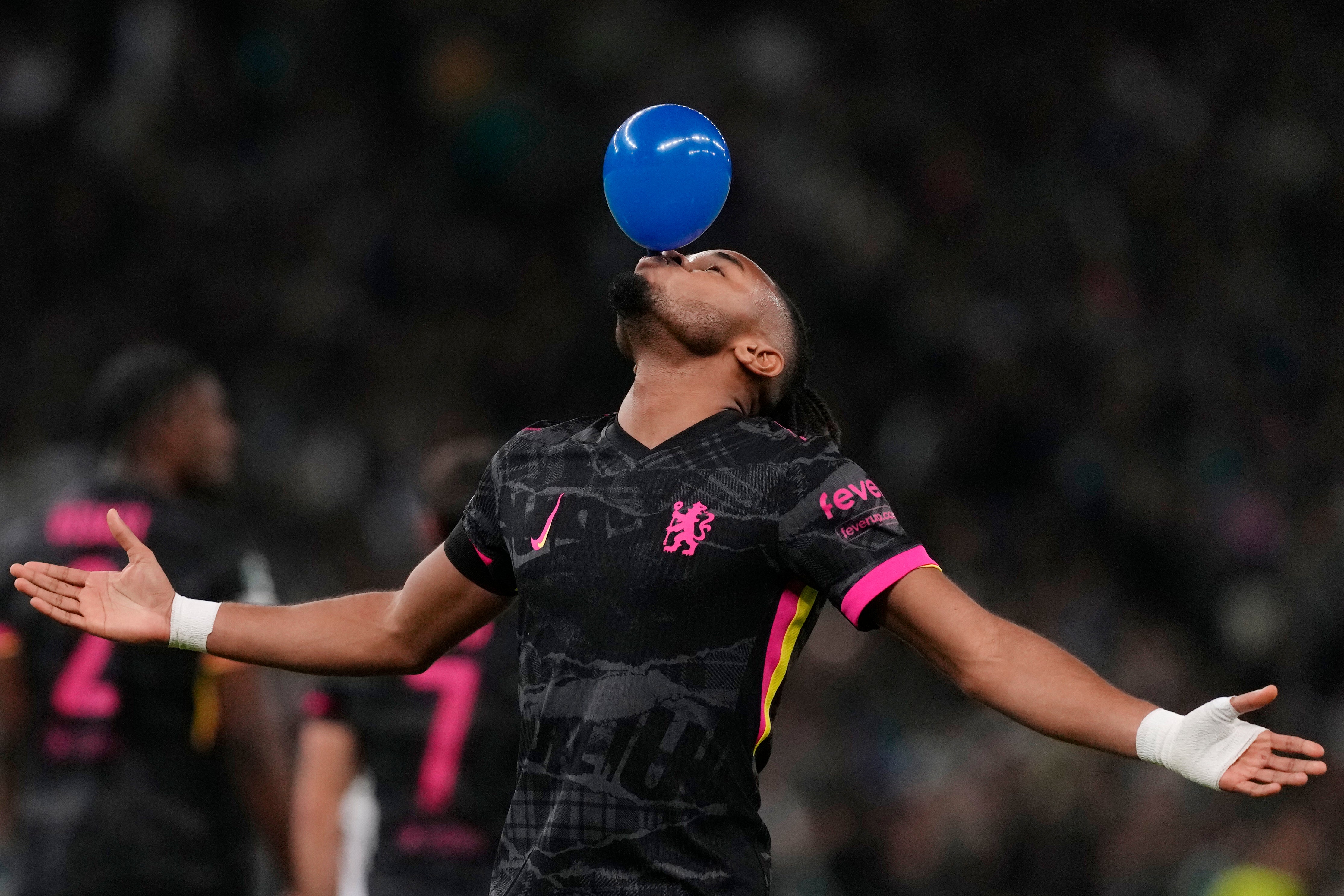 Christopher Nkunku celebrates a goal (Petros Giannakouris/AP)