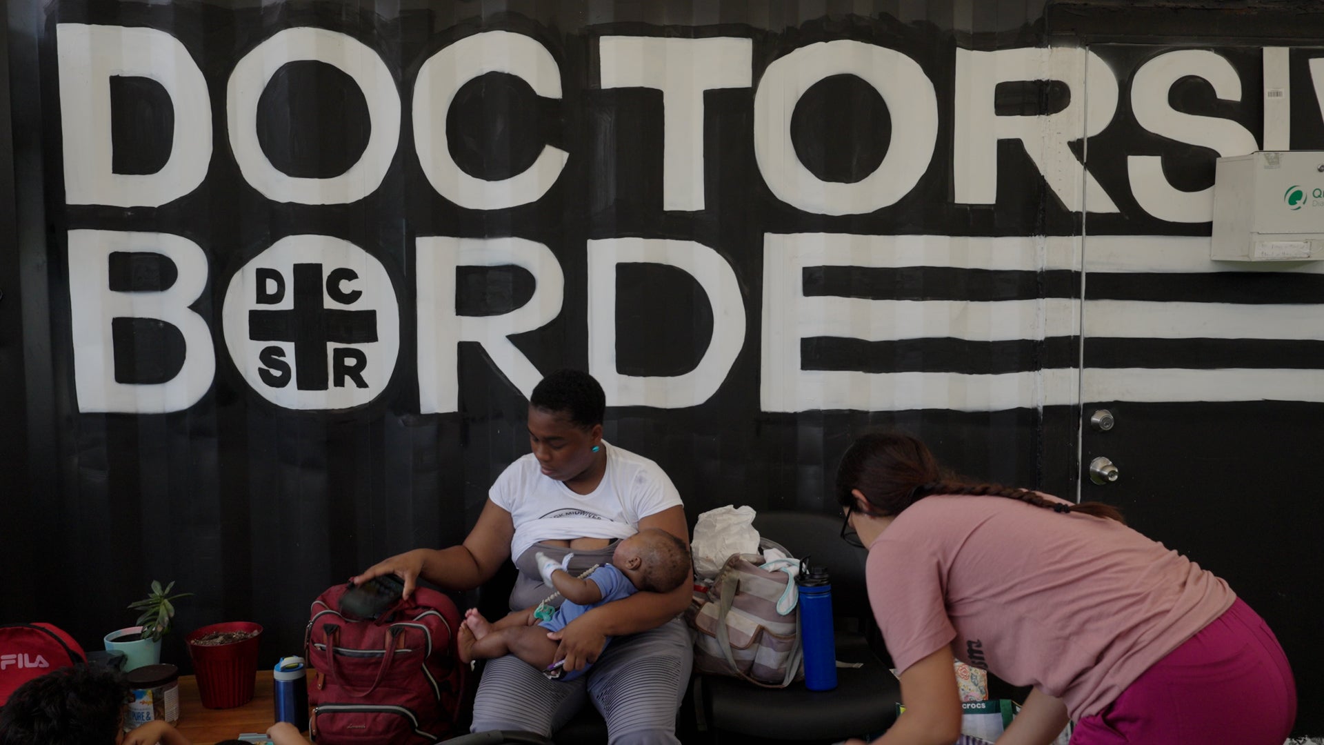 Doulas and midwives from the Southern Birth Justice Network in Florida prepare for their mobile midwife clinic