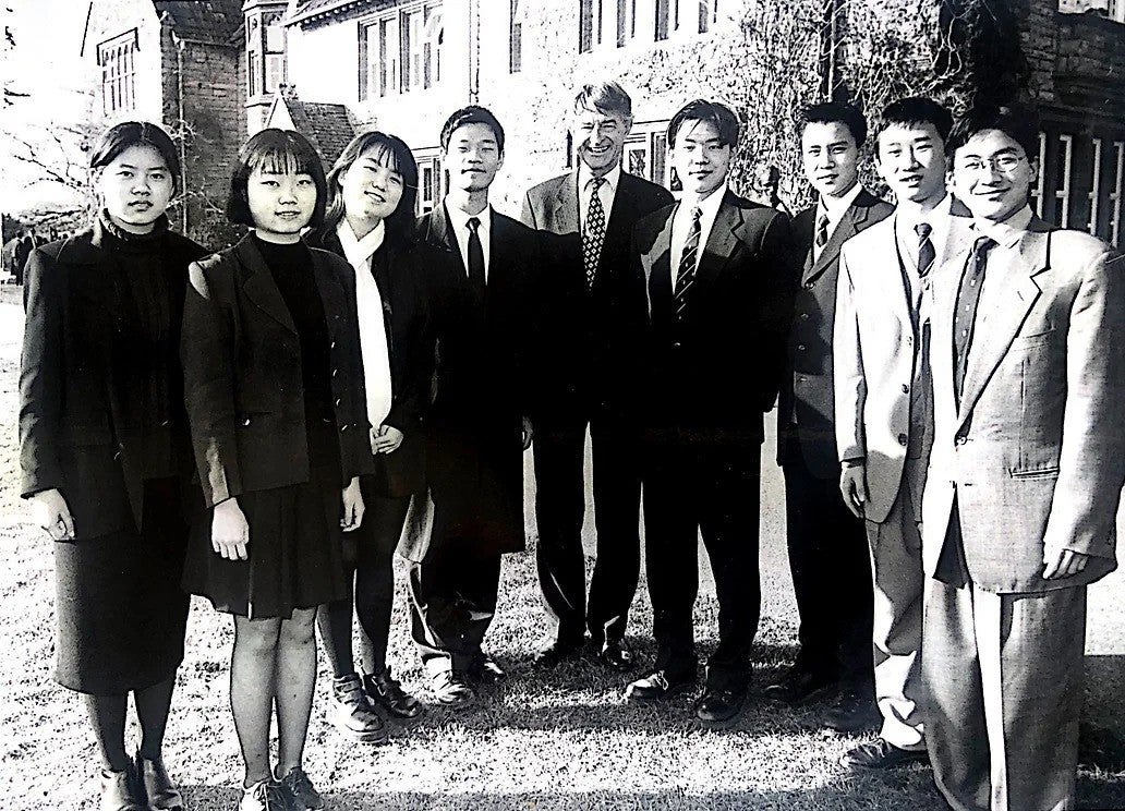 William S.D. Louey Educational Foundation scholars in 1998 with the headmaster of Millfield School before graduating to Oxbridge. Photo from Pay It Forward’s website