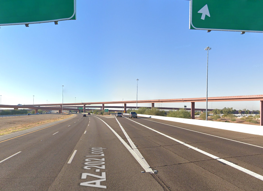 Deadly crash unfolded on Wednesday morning when the mom was driving a pickup truck along a busy East Valley freeway in Arizona (pictured)