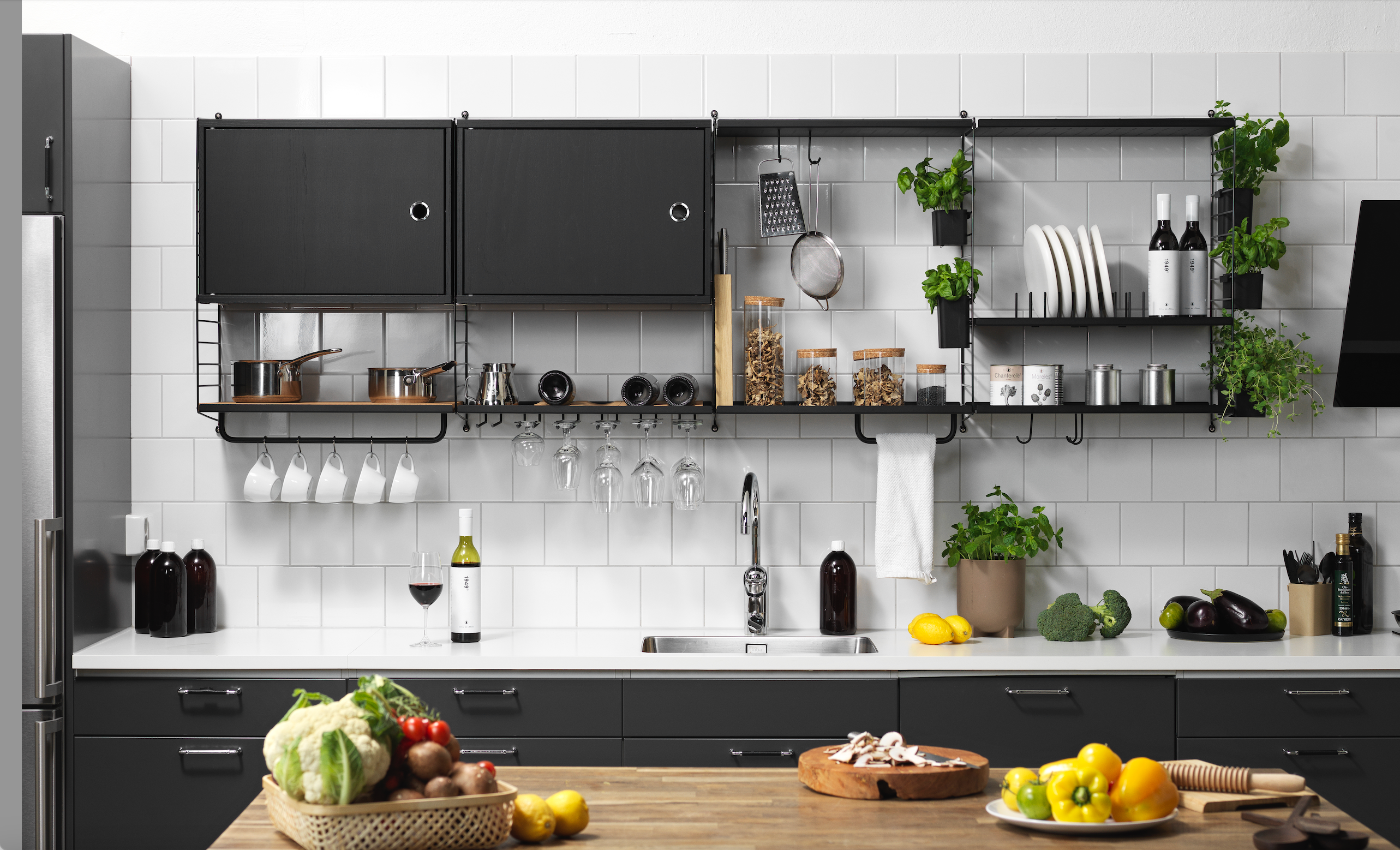 Open shelving can make even a smaller kitchen feel much larger and brighter