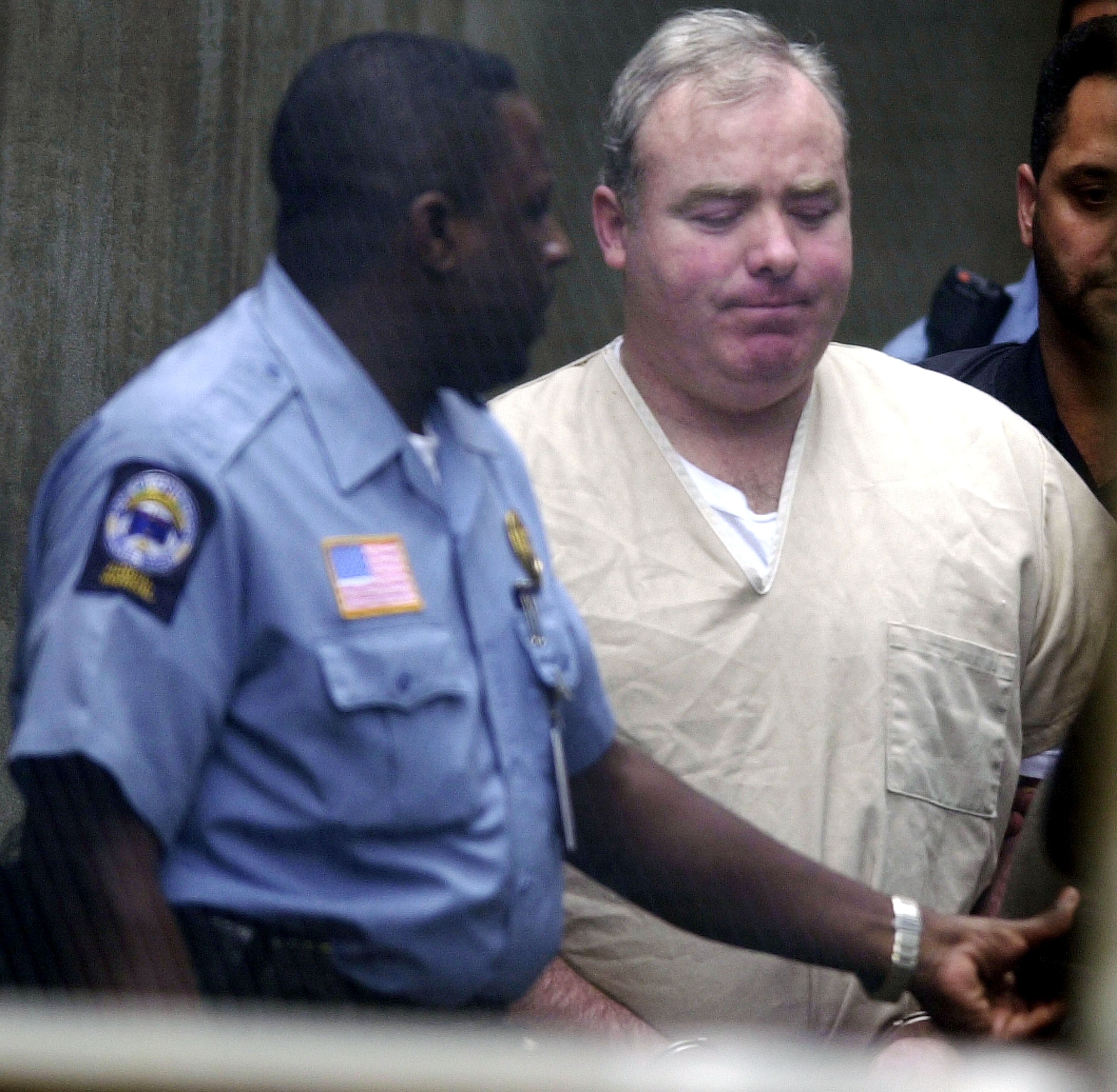 Michael Skakel is escorted out of Norwalk Superior Court after being sentenced to 20 years to life in prison for the 1975 murder of his neighbor Martha Moxley