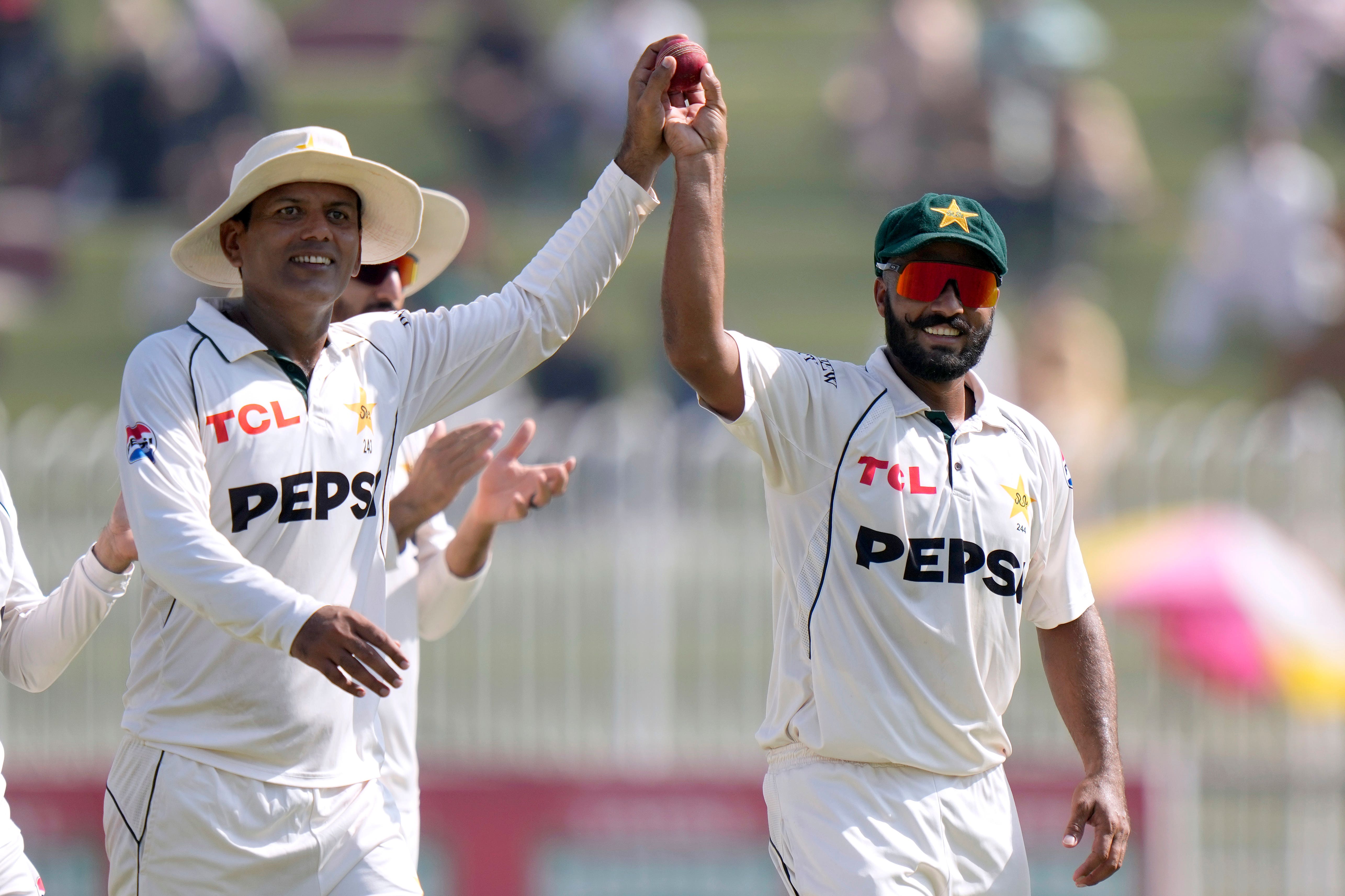 Pakistan’s Noman Ali, left, and Sajid Khan put England in a spin (Anjum Naveed/AP)