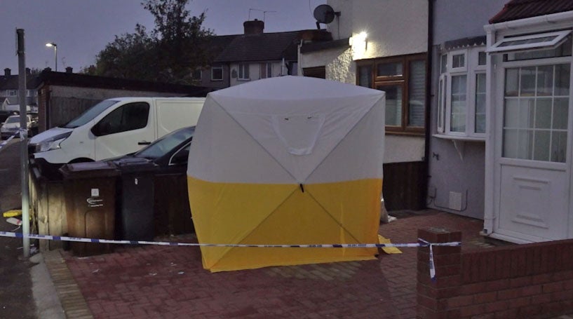 A police tent at a property on First Avenue in Dagenham following the attack