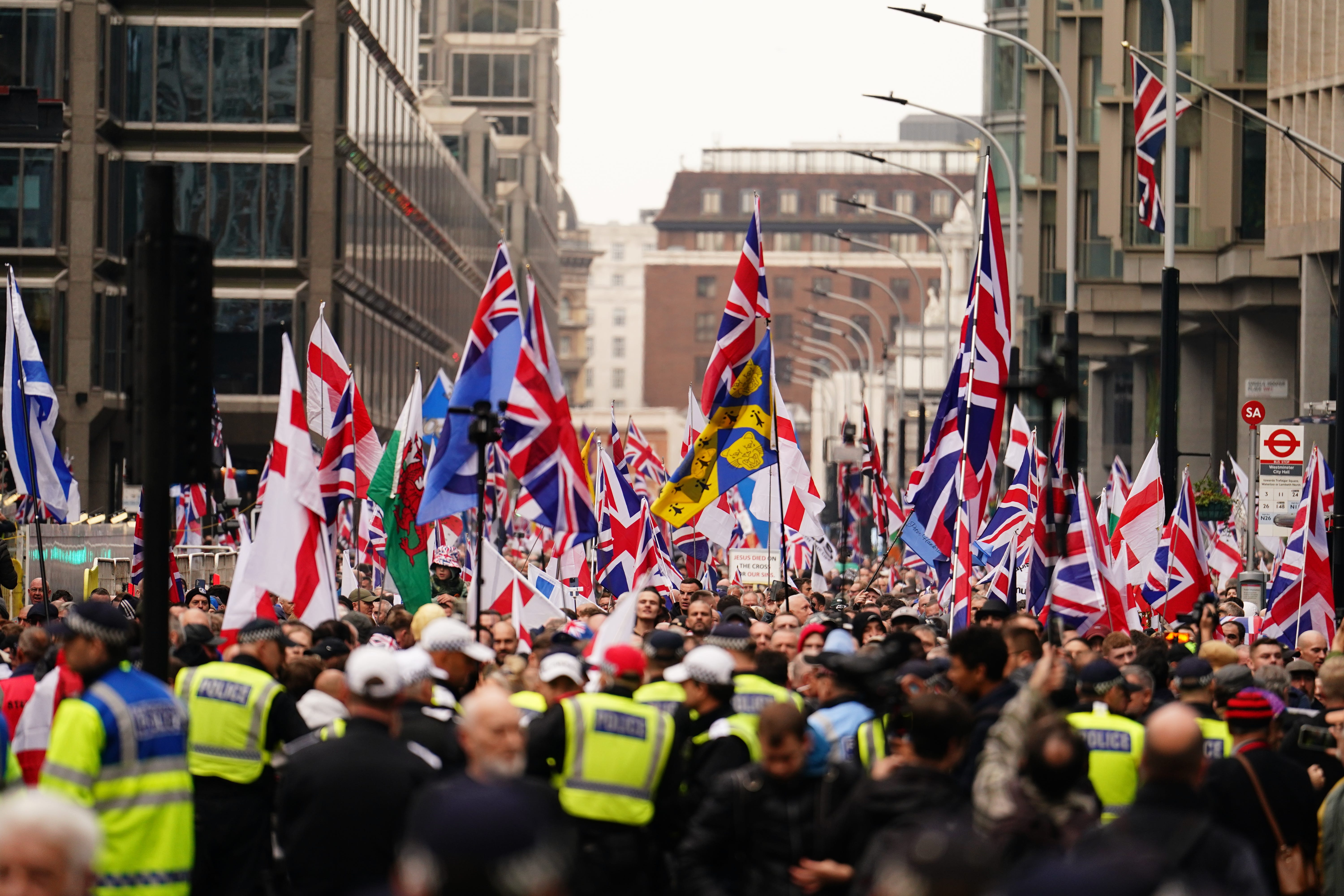 Supporters of a rally endorsed by Tommy Robinson march from Victoria Station to Parliament Square in central London. Picture date: Saturday October 26, 2024. (Jordan Pettitt/PA)